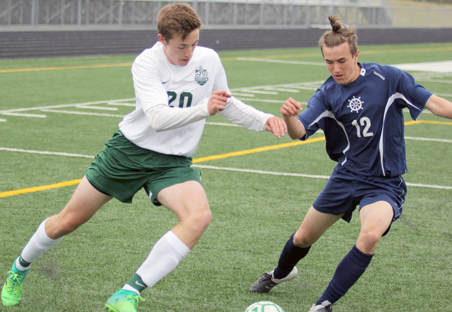 Colony sophomore Sullivan Menard tries to work past Homer’s Daniel Reutov during a 2-0 win over the Mariners in the Northern Lights Conference boys semifinals Friday, May 19, 2017, at Colony High School. (Photo by Jeremiah Bartz/Frontiersman.com)