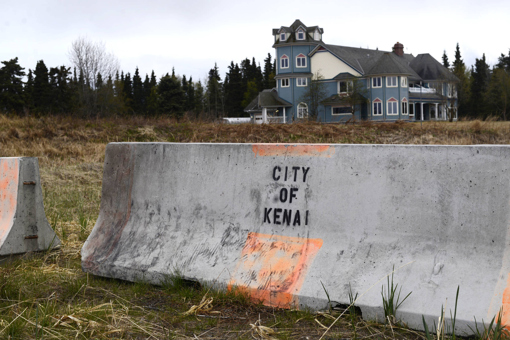 The four-story Dragseth Mansion, which the Kenai municipal government sold on Wednesday to the transportation and contraction company PRL Logistics for $825,000, sits on Kenai’s south beach Friday, May 19, 2017 in Kenai. A concrete barrier blocks the southern end of a city-owned airstrip that PRL is also seeking to buy from Kenai, requiring a permit from the Kenai Planning and Zoning Commission that will be discussed May 24. The airstrip parallels the beach alongside the Kenai River flats, valuable habitat for migratory birds, prompting concern from birders and bird advocacy groups. (Ben Boettger/Peninsula Clarion)