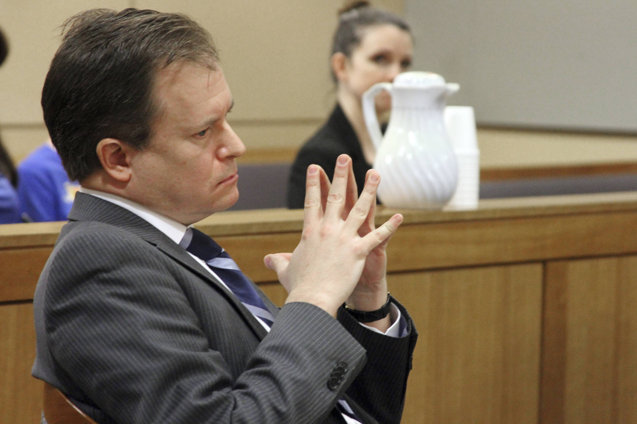 Eric Glatt, a staff attorney for the American Civil Liberties Union of Alaska, is shown listening to opening arguments Monday, May 22, 2017, in Anchorage, Alaska, in a lawsuit to stop a recall election in Homer, Alaska. Glatt is representing three city council members in Homer who sponsored a resolution to promote inclusivity after President Donald Trump’s election. (AP Photo/Mark Thiessen)