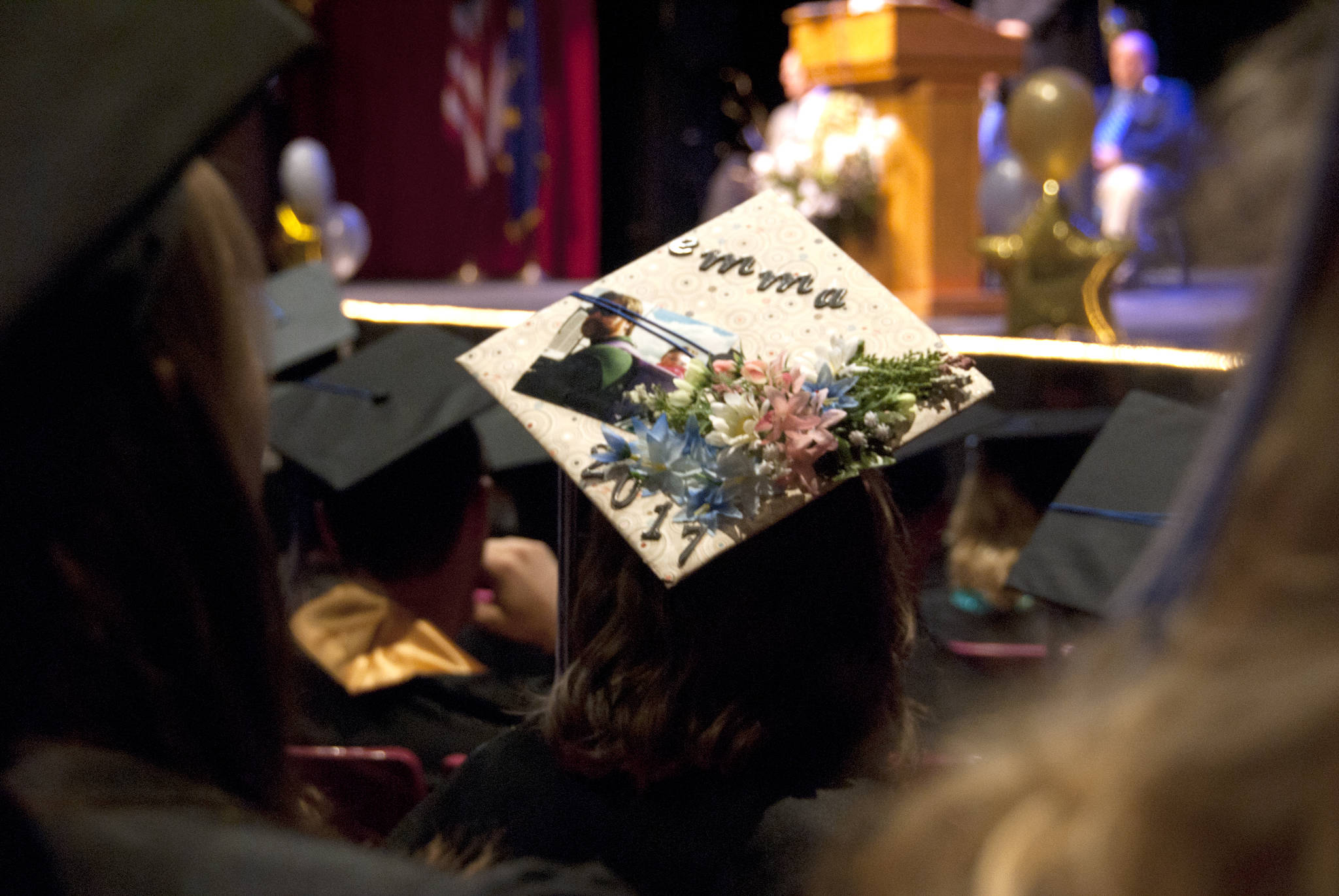 A Connections Home School graduate sports a decorated cap at her graduation ceremony Thursday at the Soldotna High School auditorium. (Kat Sorensen/Peninsula Clarion)