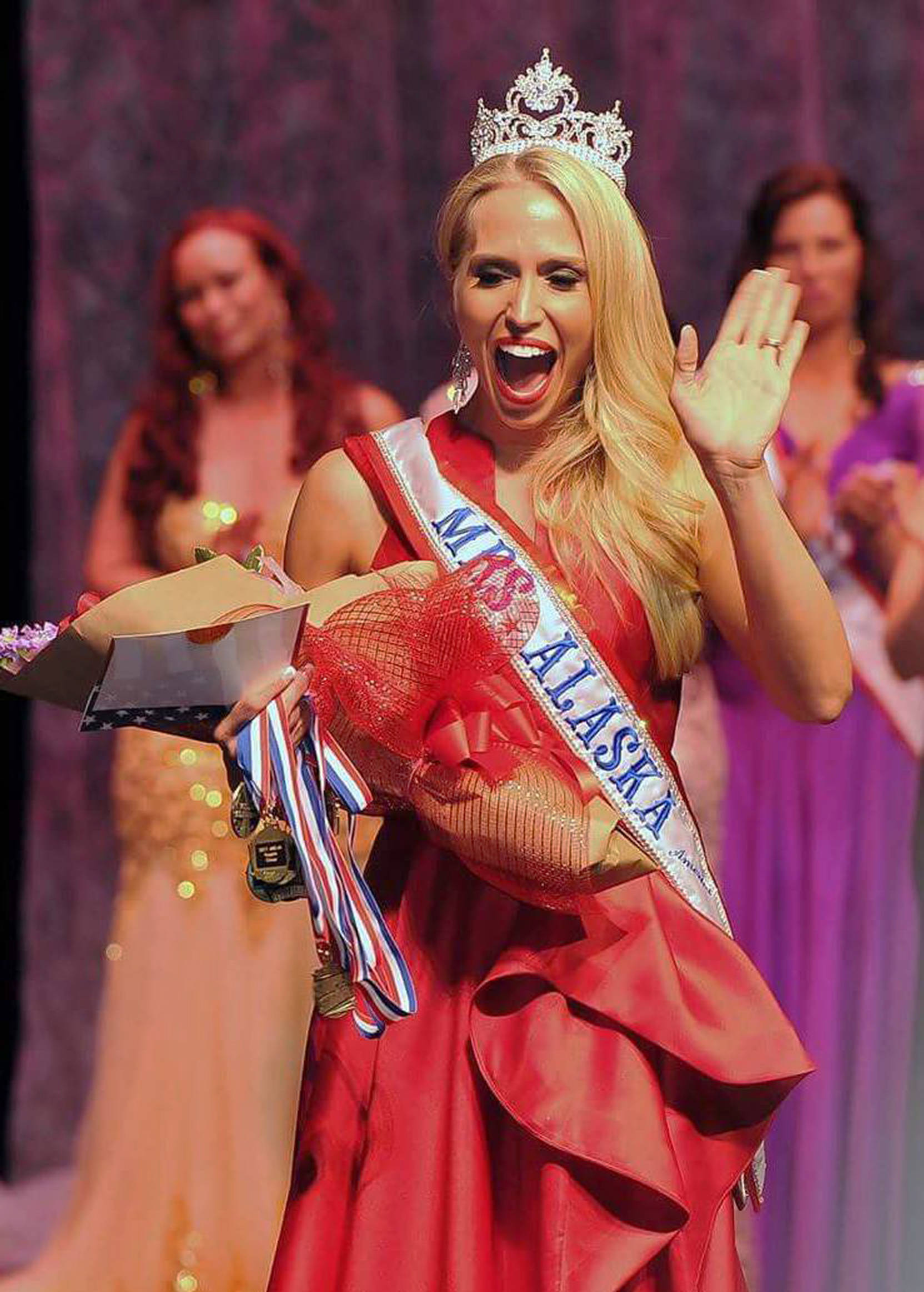 Redoubt Elementary second-grade teacher Kersten Gomez, 37, reacts to winning the Mrs. Alaska America competition May 13 in Anchorage, Alaska. Gomez is the second woman in two years from the central Kenai Peninsula to claim first place in the event. (Photo courtesy Rita Corwin)