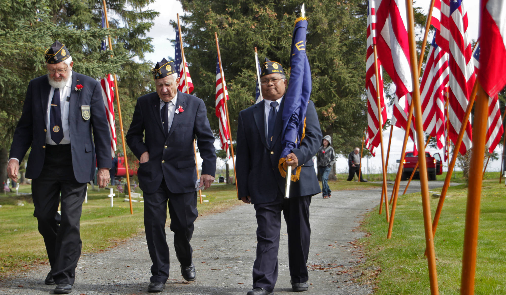 American Legion members Ray Nickleson (left), Joe Coup, and Alvin Diaz leave the Kenai Cemetery after participating in a Memorial Day ceremony on Monday, May 29, 2017 in Kenai, Alaska. (Ben Boettger/Peninsula Clarion)