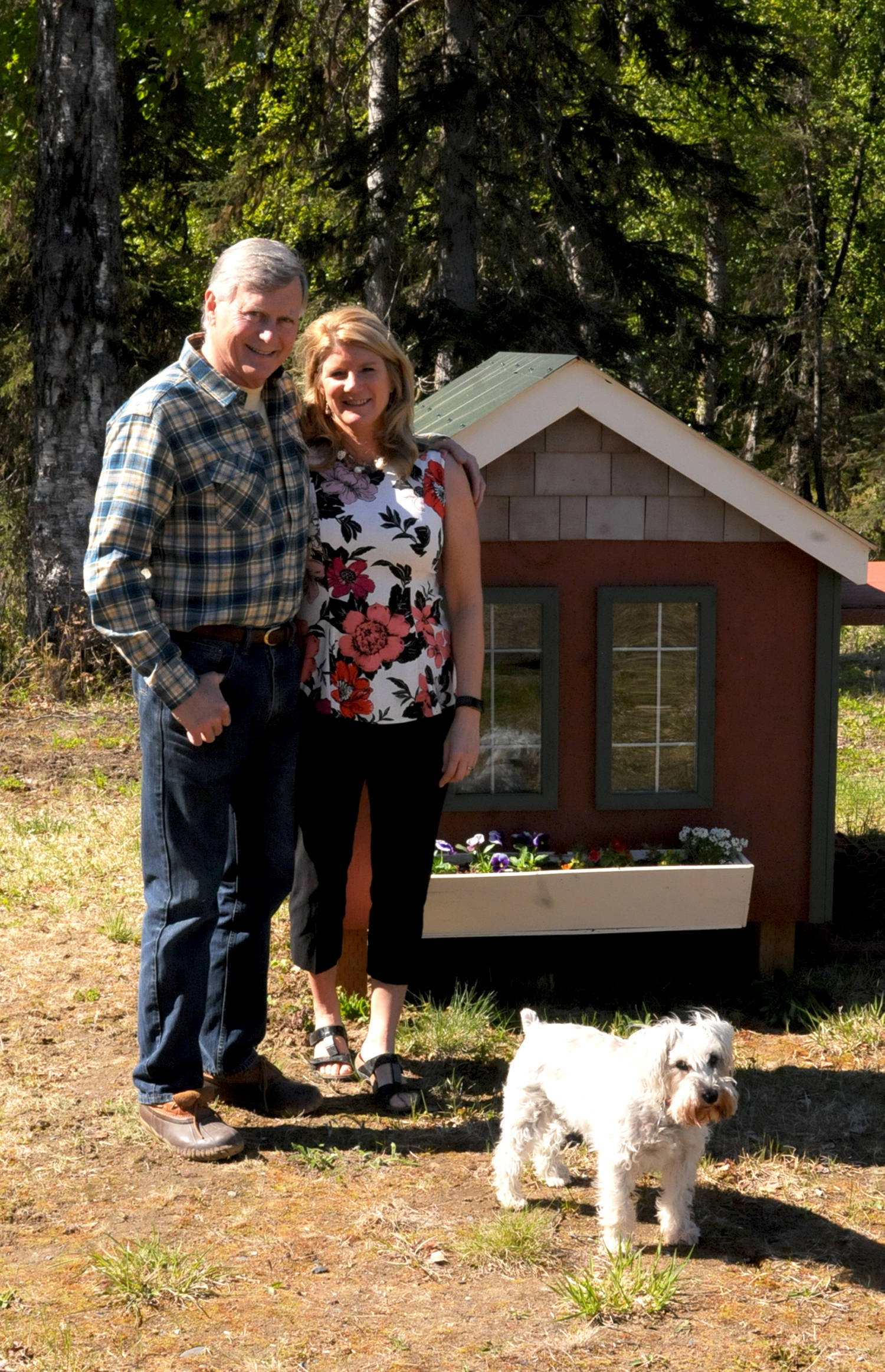 Ted and Elaina Spraker stand in the yard of their home Thursday in Soldotna. The Legislature recently confirmed Ted Spraker for his sixth consecutive term as a member of the Board of Game, where he currently serves as chairman. (Elizabeth Earl/Peninsula Clarion)