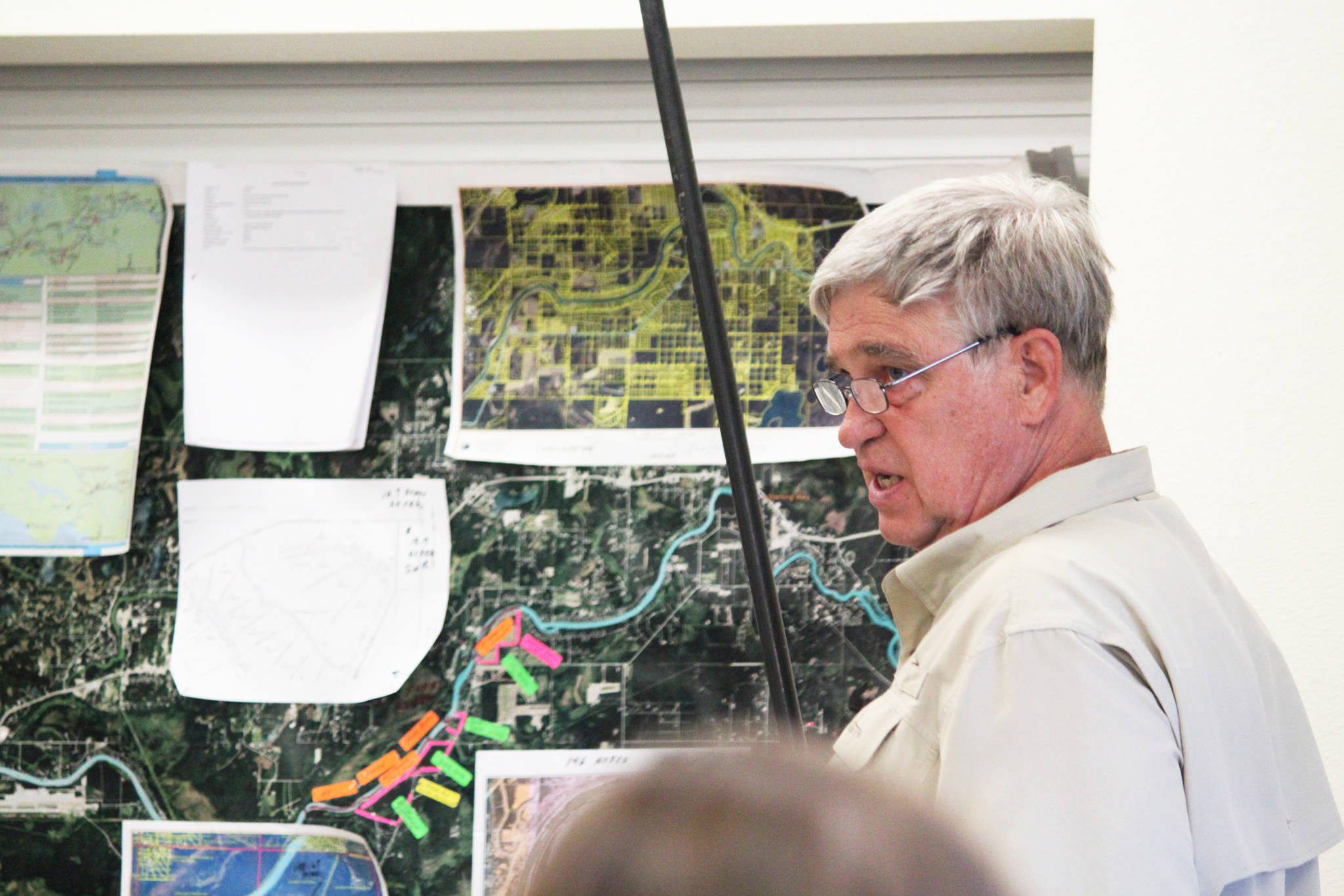 Jim Harpring, Funny River resident and co-chair of the Funny River Boat Launch Coalition, speaks to a crowd assembled Friday at the Funny River Community Center in Funny River to discuss the pros and cons of a boat launch on that road to increase public access to the Kenai River. (Megan Pacer/Peninsula Clarion)