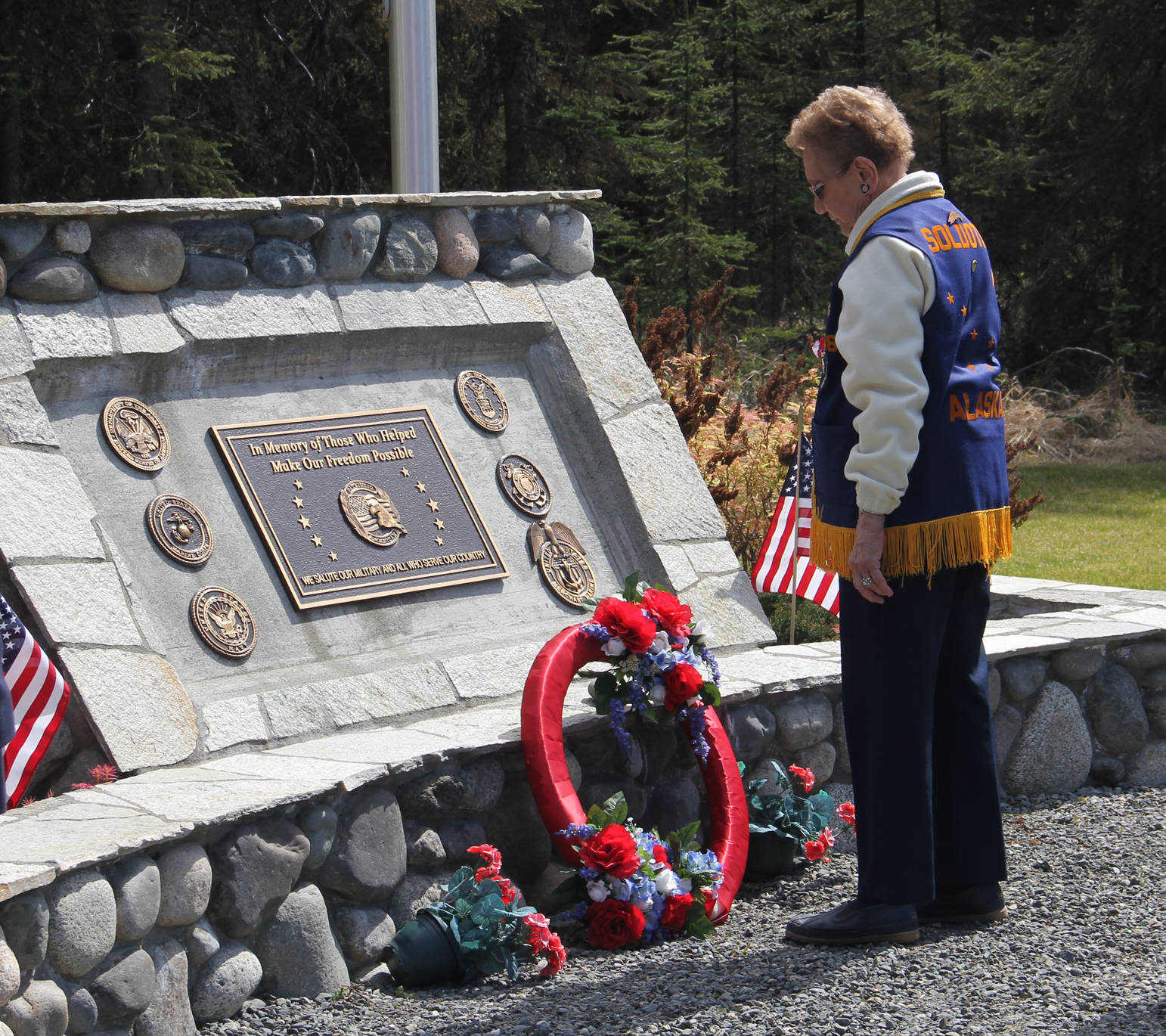 VFW Auxiliary places wreaths at Veterans memorial in Soldotna.