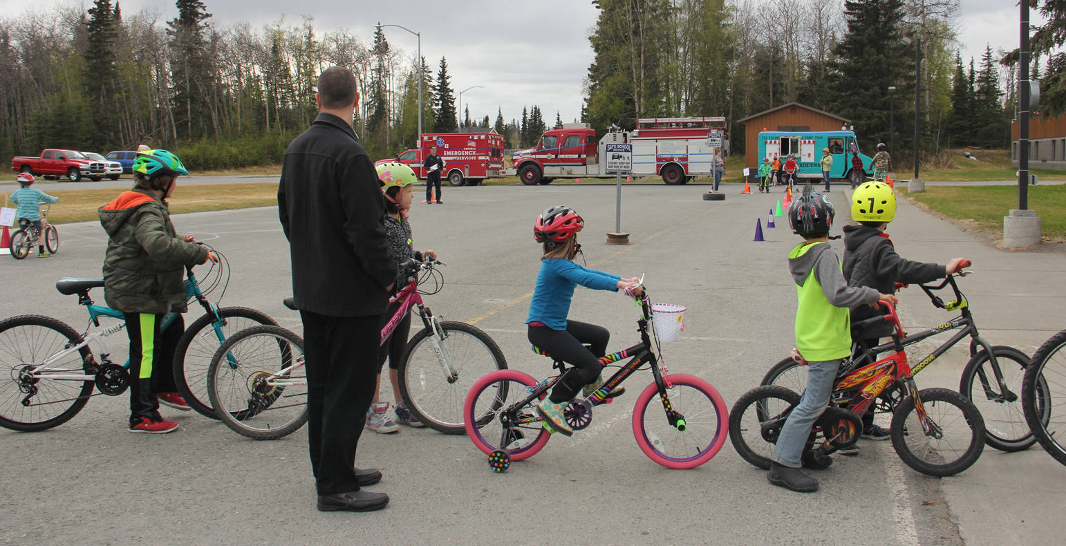 Rodeo participants ride the safety stations at Redoubt Elementary School.