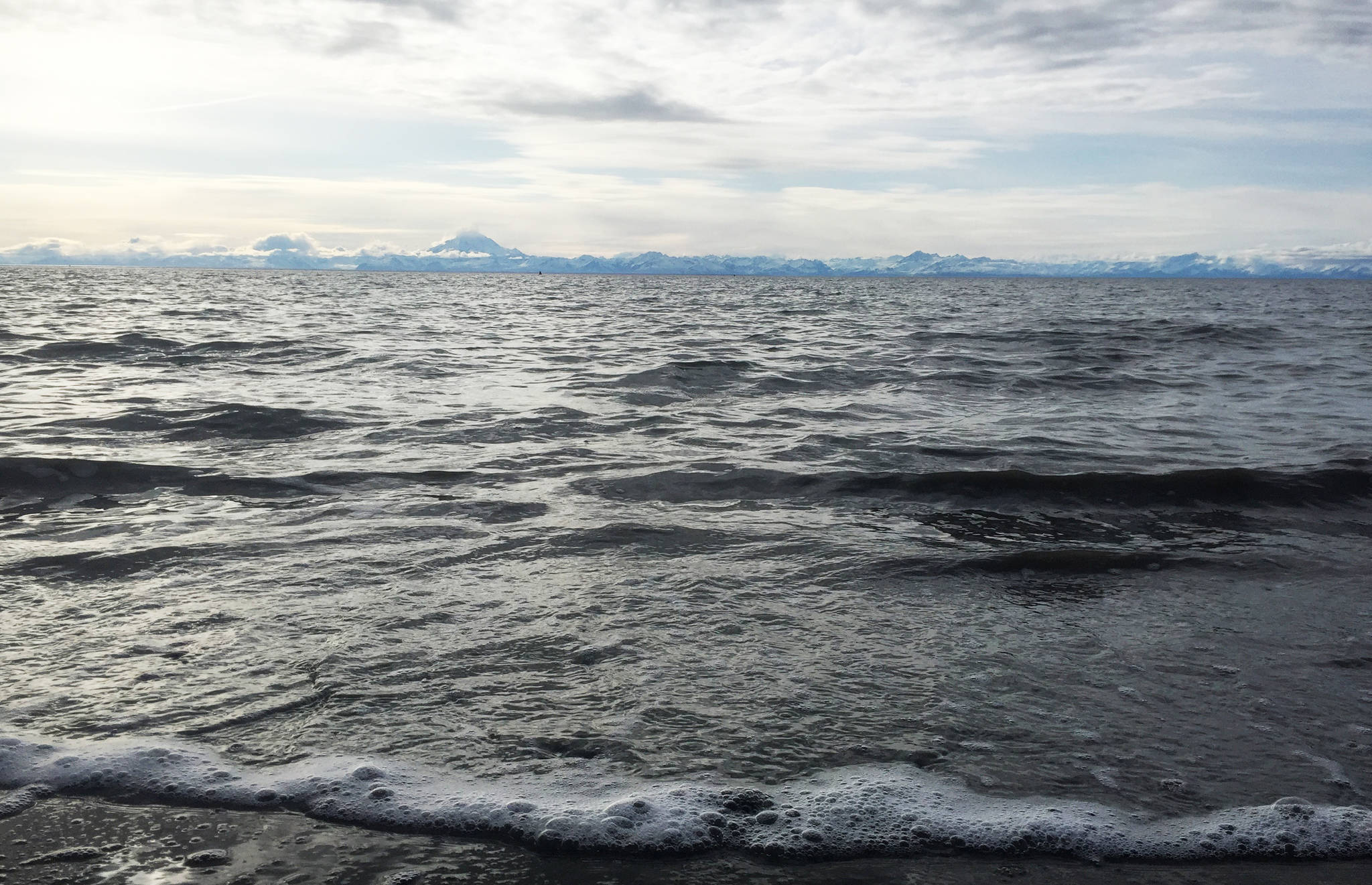 In this April 2017 photo taken with a smart phone, the tide rushes in on the north Kasilof beach in Kasilof, Alaska. (Elizabeth Earl/Peninsula Clarion)