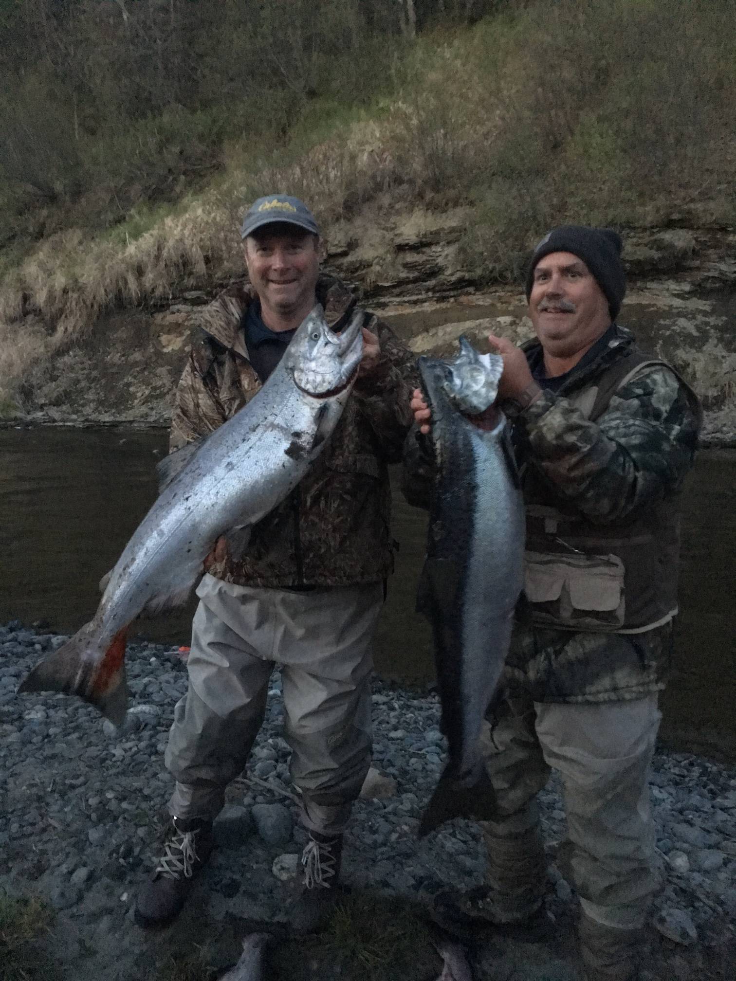 Two lucky anglers hold up king salmon they caught on Deep Creek on the lower Kenai Peninsula this weekend. (Photo courtesy Greg Harrington)  Two lucky anglers hold up king salmon they caught on Deep Creek on the lower Kenai Peninsula this weekend. (Photo courtesy Greg Harrington)