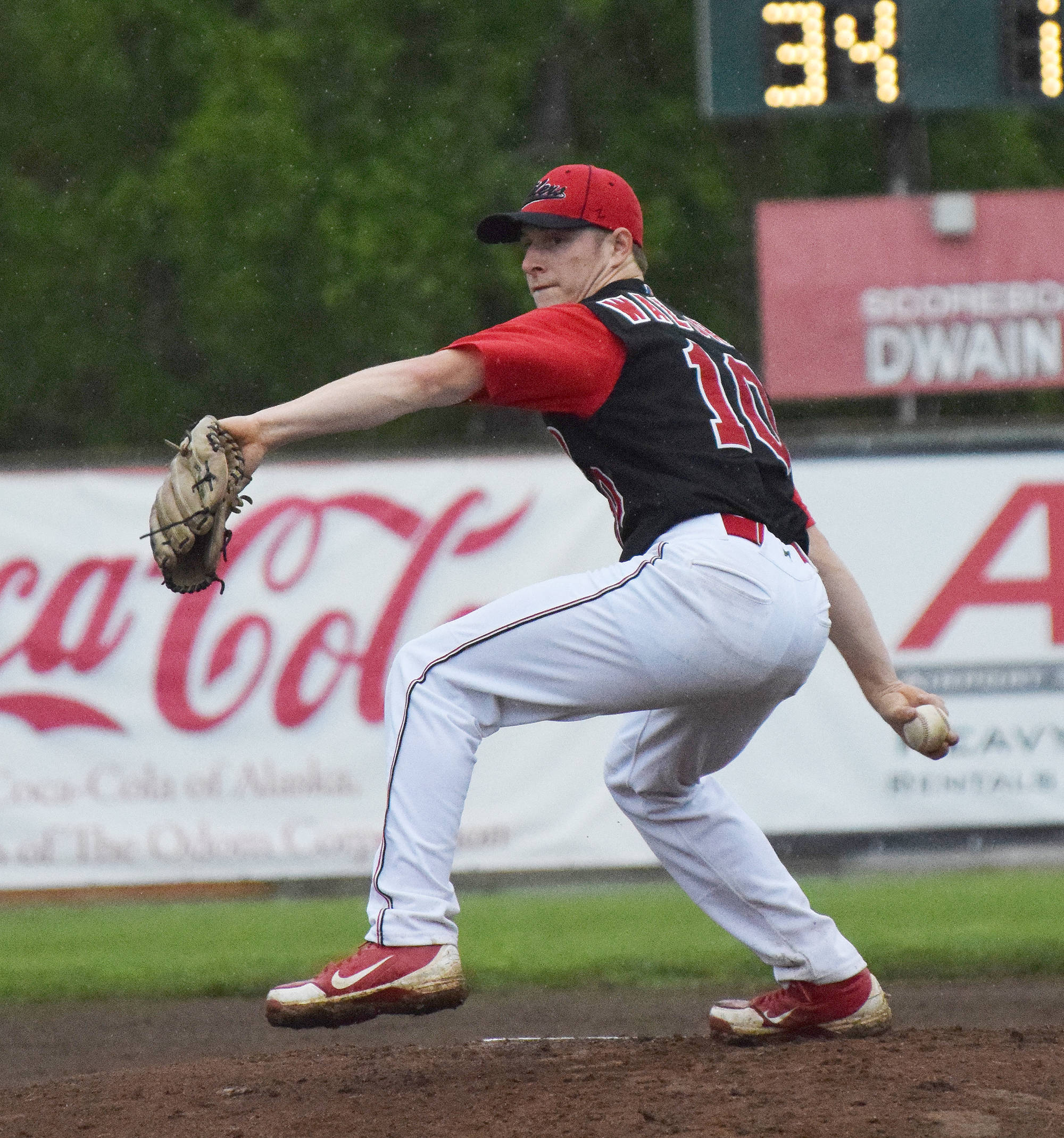 Peninsula Oilers starting pitcher Tyler Waldrop winds up for the throw Friday night against the Mat-Su Miners at Coral Seymour Memorial Park in Kenai. (Photo by Joey Klecka/Peninsula Clarion)