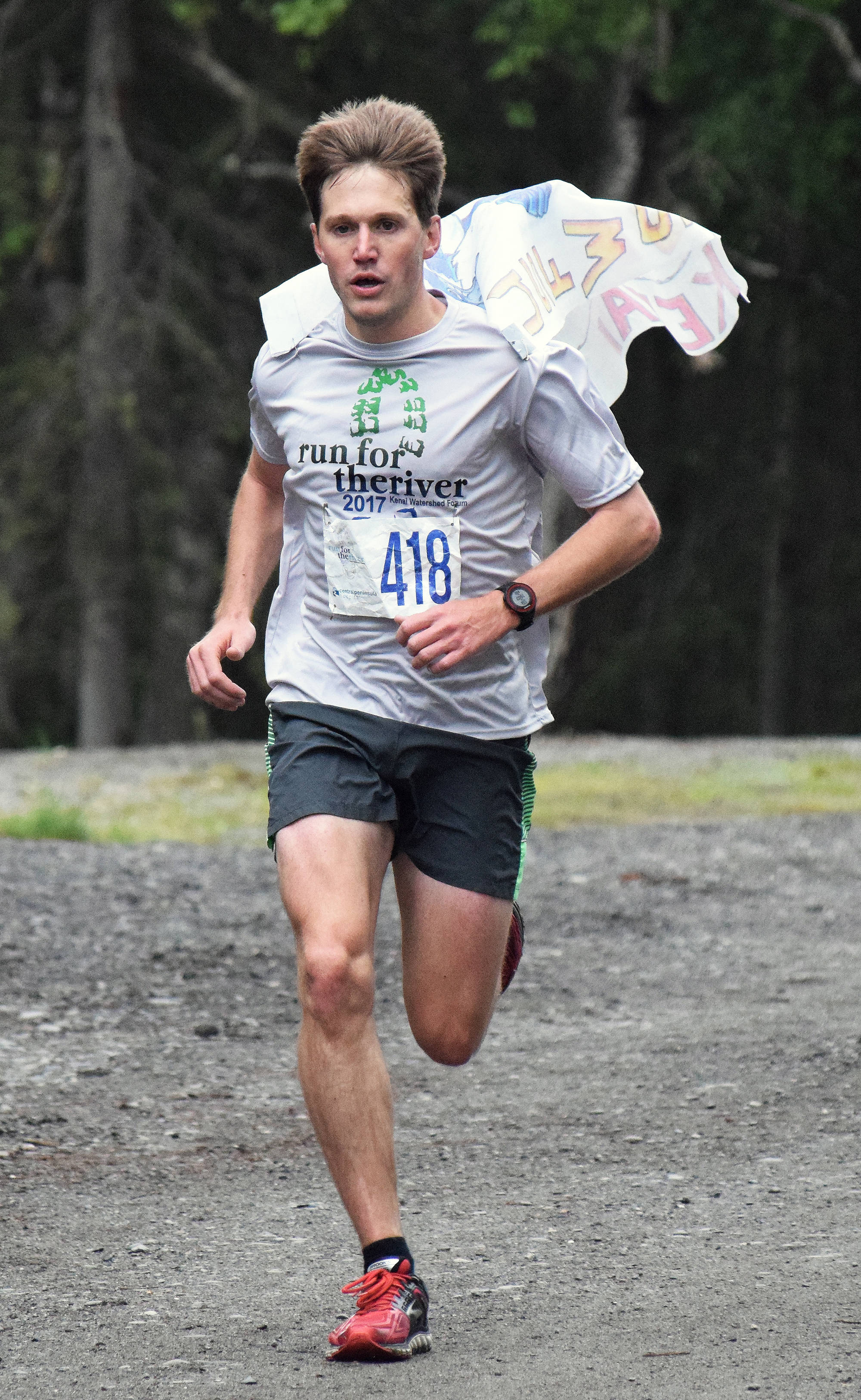 Men’s Run for the River 5-kilometer winner Travis Mabe races to the finish line Saturday morning in Soldotna. (Photo by Joey Klecka/Peninsula Clarion)