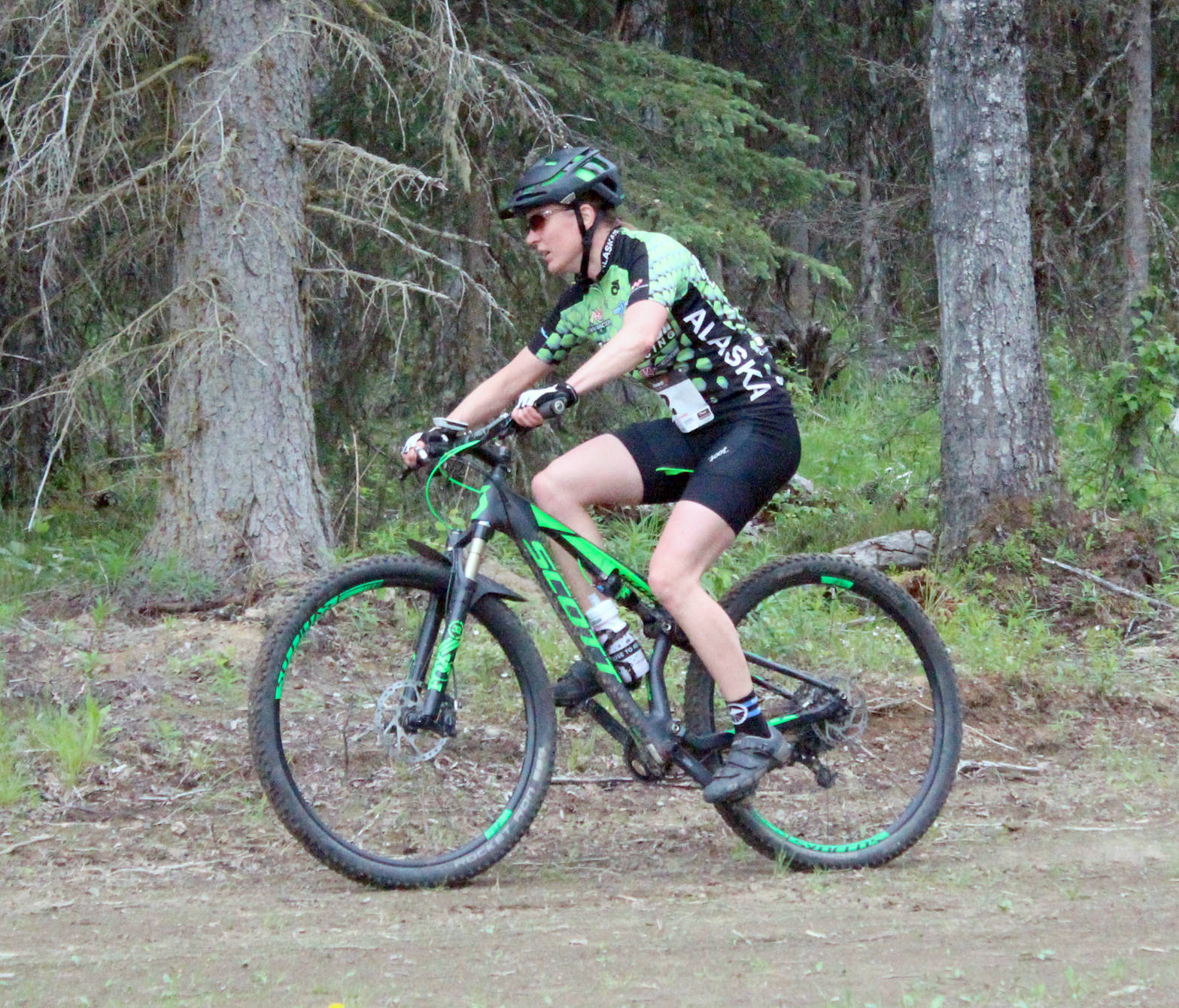 Women’s winner Amber Bethe cruises through the Wolverine Loop at the Snippit Loppet Duathlon on Sunday, June 11, 2017, at Tsalteshi Trails. (Photo by Megan Pacer/Peninsula Clarion)