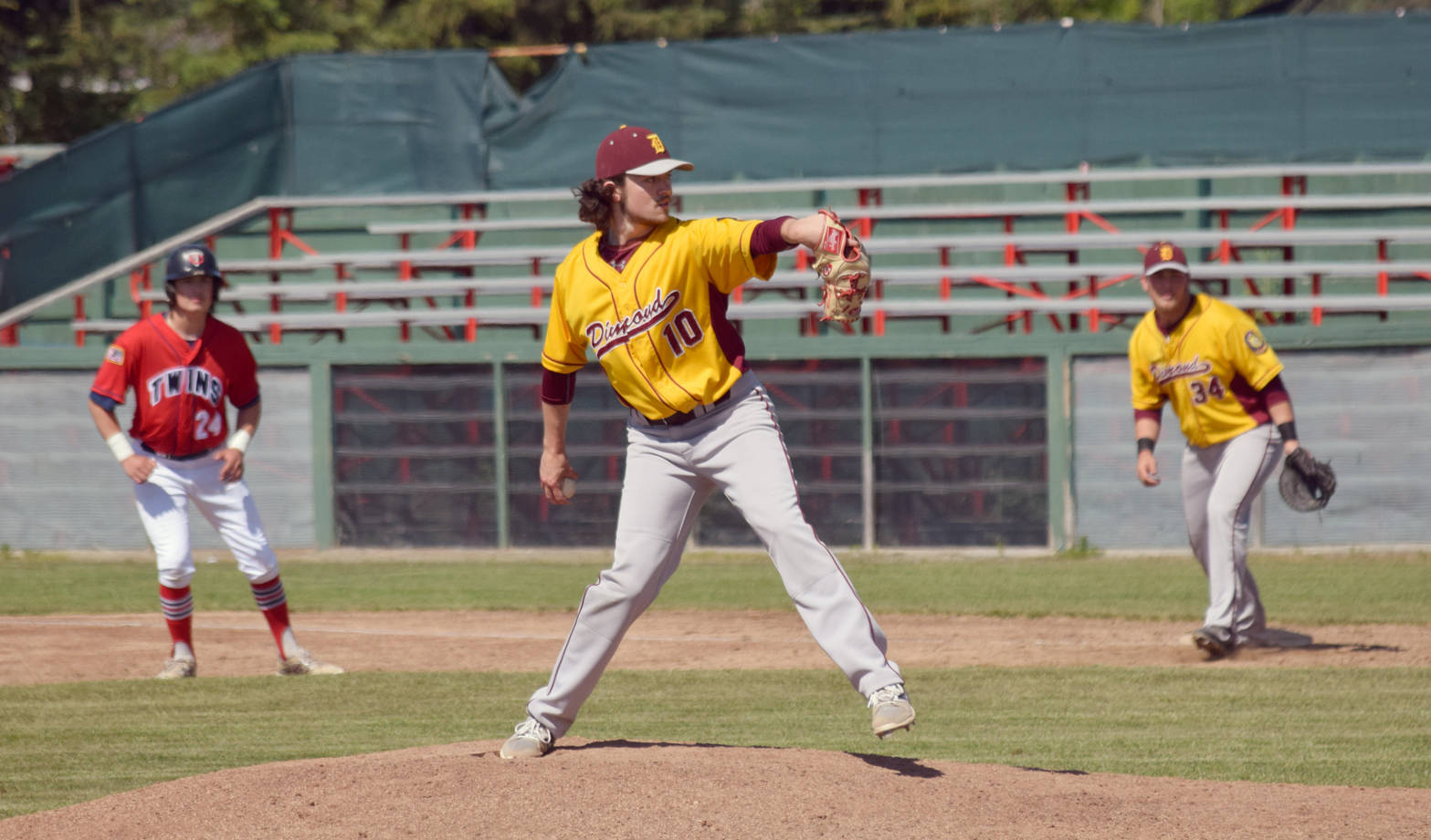 Winning pitcher Jake Andresen of Dimond delivers home against the Twins in the first game of a doubleheader Saturday, June 17, 2017, at Coral Seymour Memorial Ballpark in Kenai. (Photo by Jeff Helminiak/Peninsula Clarion)