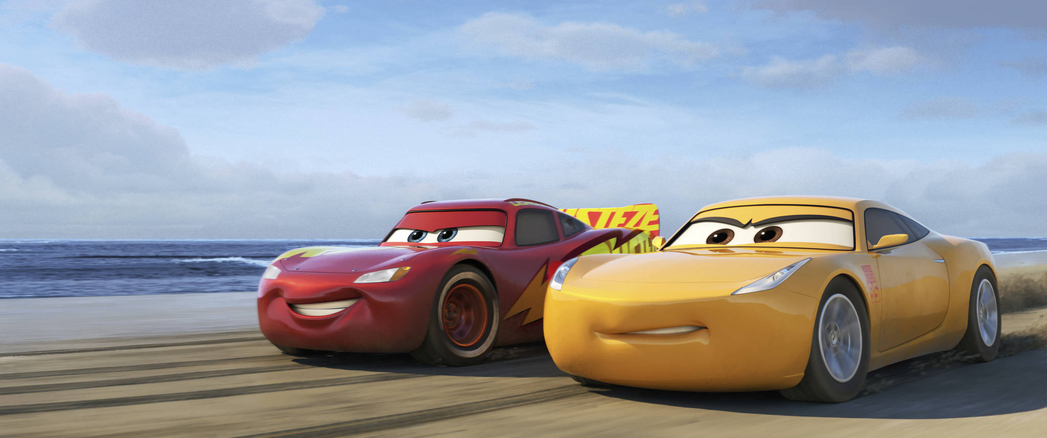 This image released by Disney shows Lightning McQueen, voiced by Owen Wilson, left, and Cruz Ramirez, voiced by Cristela Alonzo in a scene from “Cars 3.” (Disney-Pixar via AP)