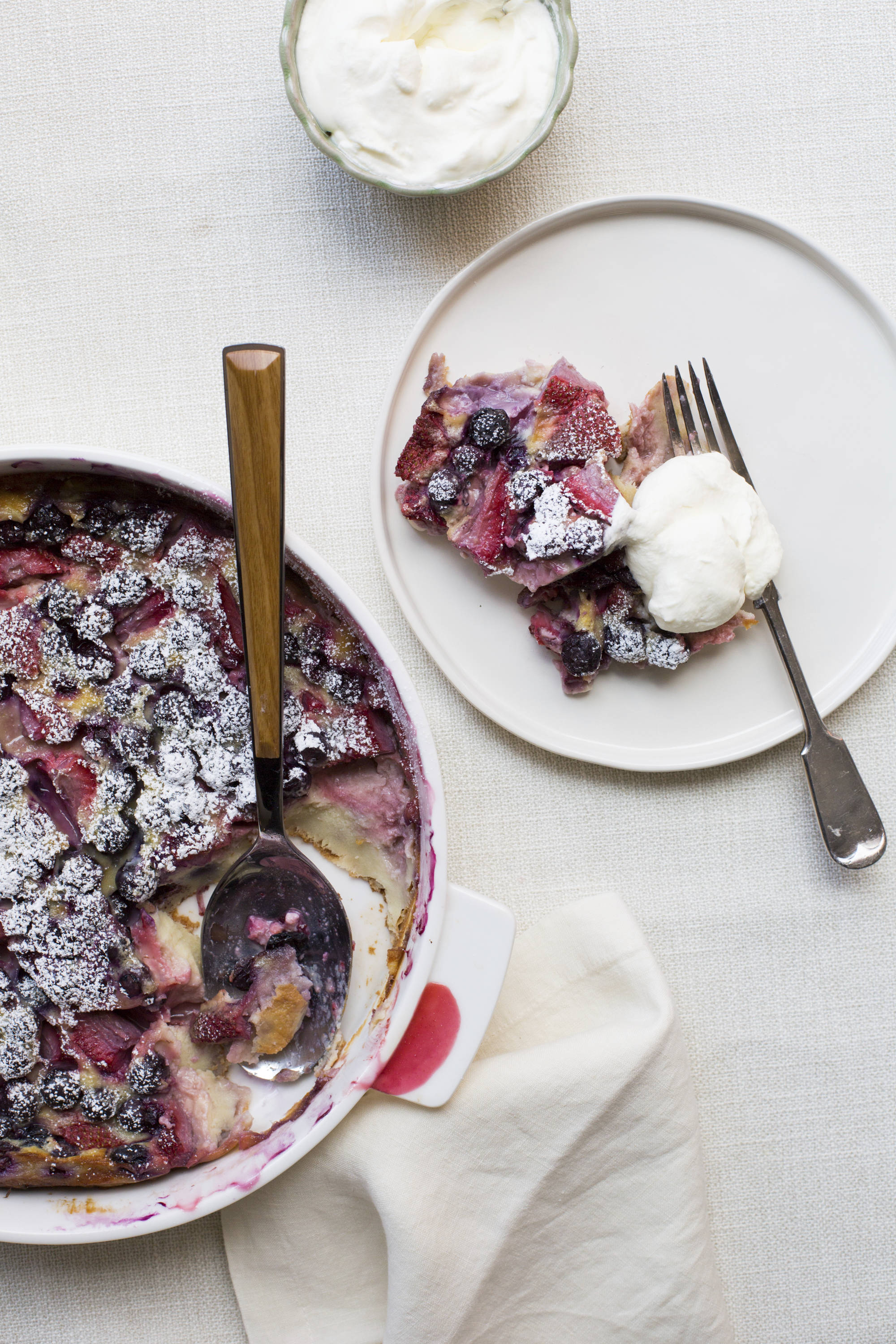 This June 1 photo shows a berry clafoutis in New York. This dish is from a recipe by Katie Workman. (Sarah E Crowder via AP)