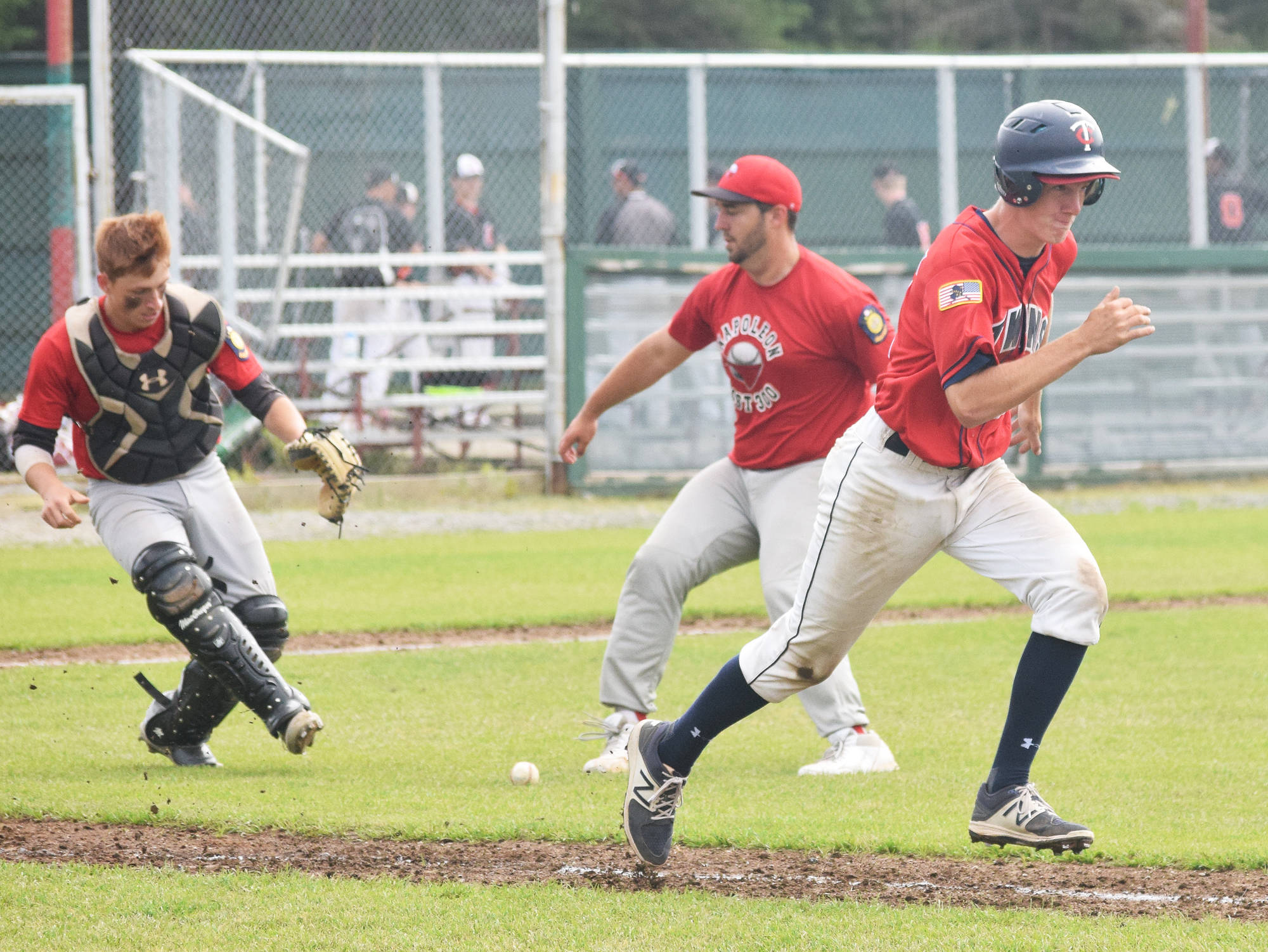 Post 20 Twins catcher Cody Quelland races to beat out a bunt hit against Napoleon, Ohio, Wednesday at the Bill Miller Wood Bat Tournament at Coral Seymour Memorial Ballpark in Kenai. (Photo by Joey Klecka/Peninsula Clarion)