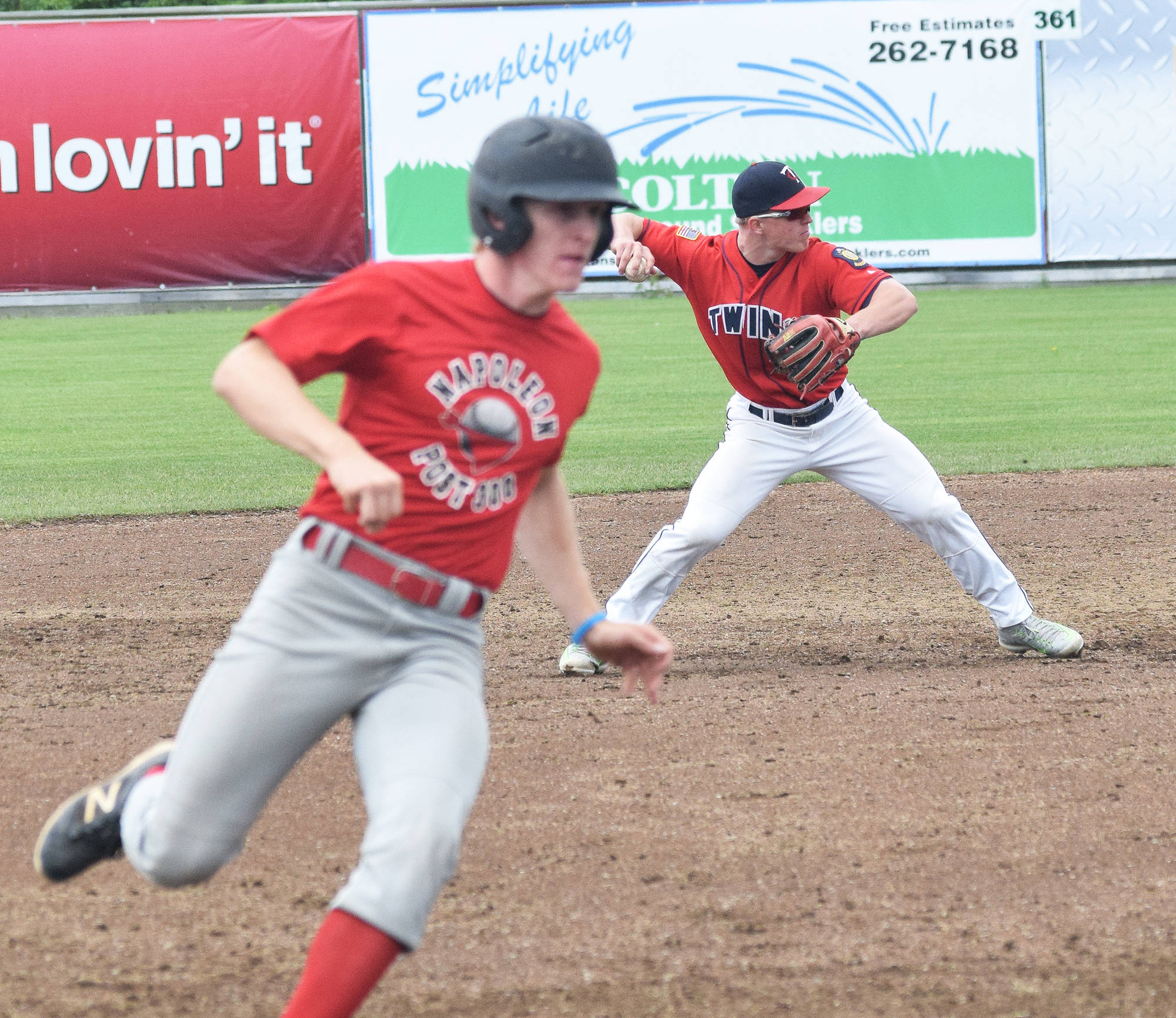 Post 20 Twins shortstop Paul Steffensen scoops up a groundball and throws to first on a play against the Napoleon, Ohio, River Bandits Wednesday at the Bill Miller Wood Bat Tournament at Coral Seymour Memorial Ballpark in Kenai. (Photo by Joey Klecka/Peninsula Clarion)