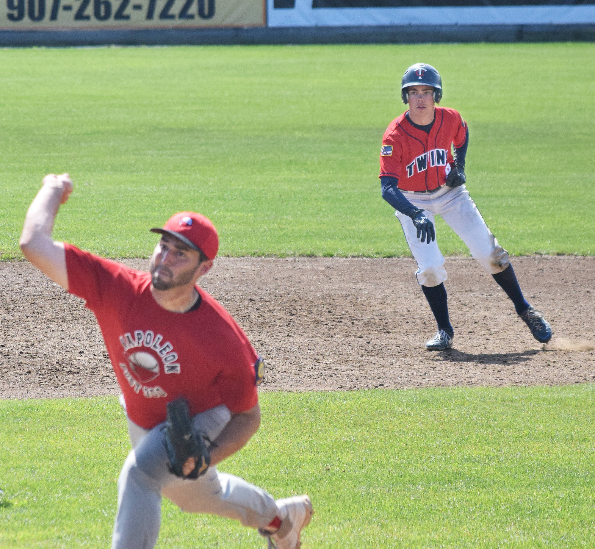 Post 20 Twins outfielder Spencer Warren (9) keeps an eye on Napoleon, Ohio, pitcher Kody King late in the game Wednesday at the Bill Miller Wood Bat Tournament at Coral Seymour Memorial Ballpark in Kenai. (Photo by Joey Klecka/Peninsula Clarion)