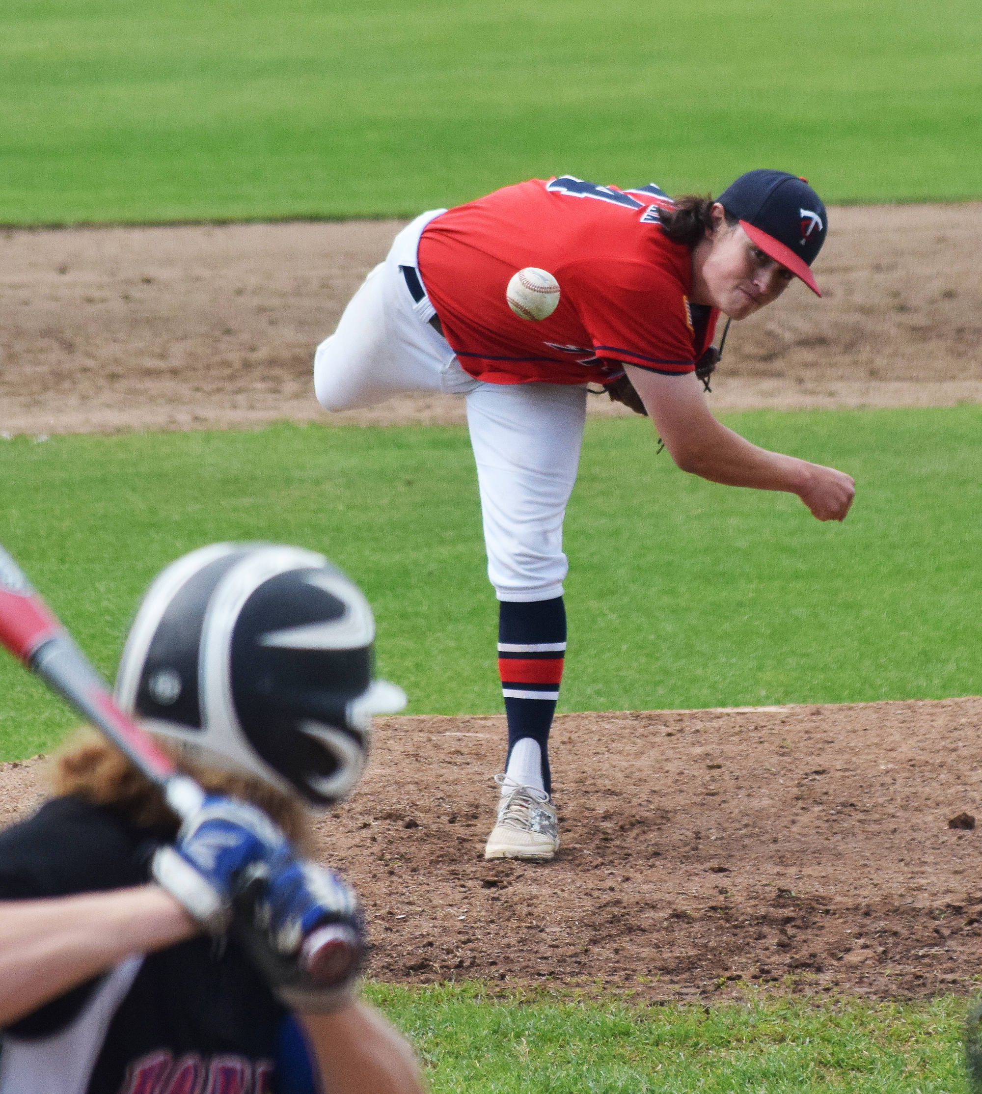 Post 20 Twins pitcher Calvin Hills delivers a pitch to a Palmer batter Sunday at Coral Seymour Memorial Ballpark in Kenai. (Photo by Joey Klecka/Peninsula Clarion)