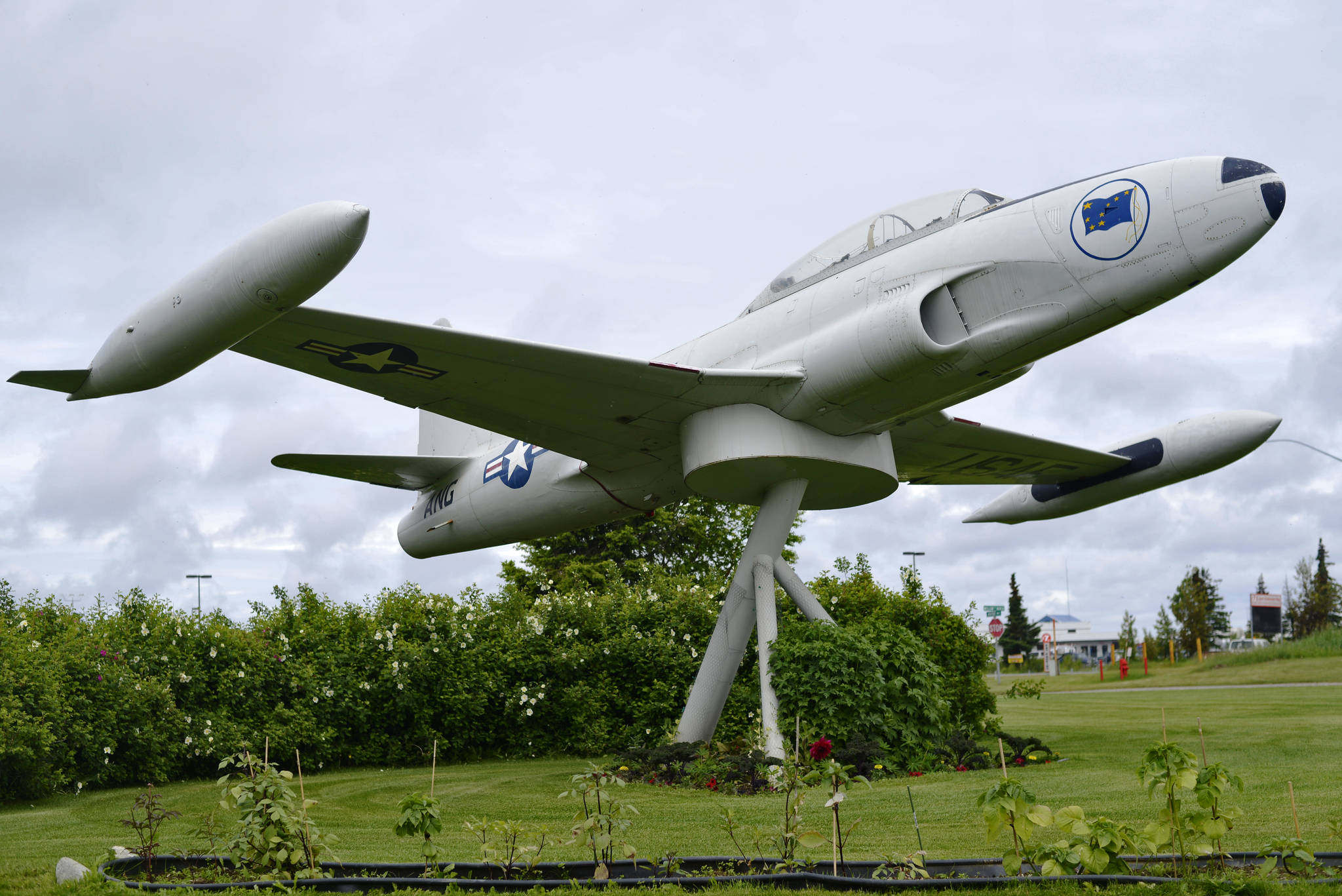 A retired U.S Airforce Lockheed T-33 fighter jet stands on a pedestal in front of the Kenai Municipal Airport on July 7, 2017 in Kenai. The Kenai Airport Commission is discussing giving the plane a fresh coat of paint this summer. (Ben Boettger/Peninsula Clarion)