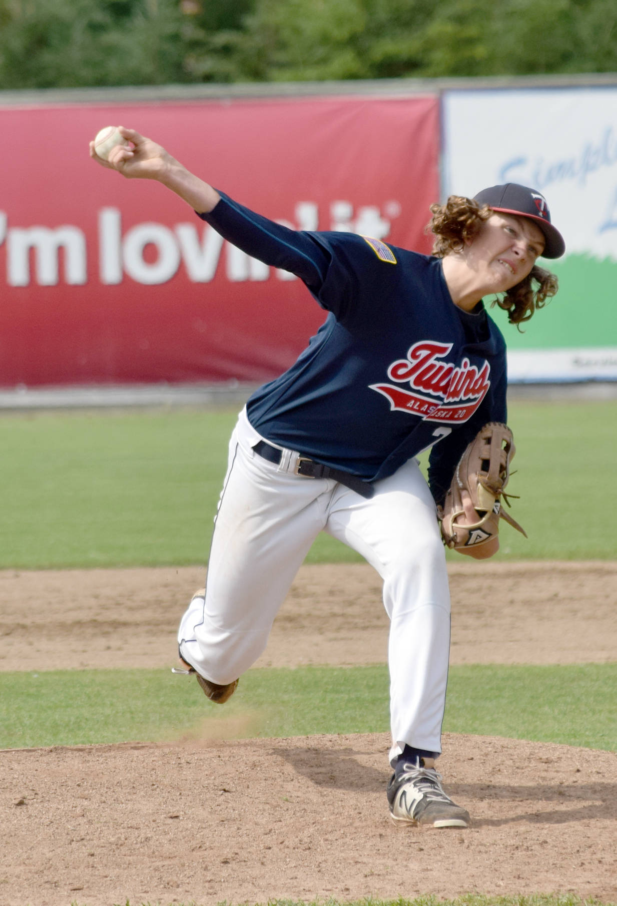 Logan Smith of the Twins delivers to the Wasilla Road Warriors on Sunday, July 16, 2017, at Coral Seymour Memorial Park in Kenai.