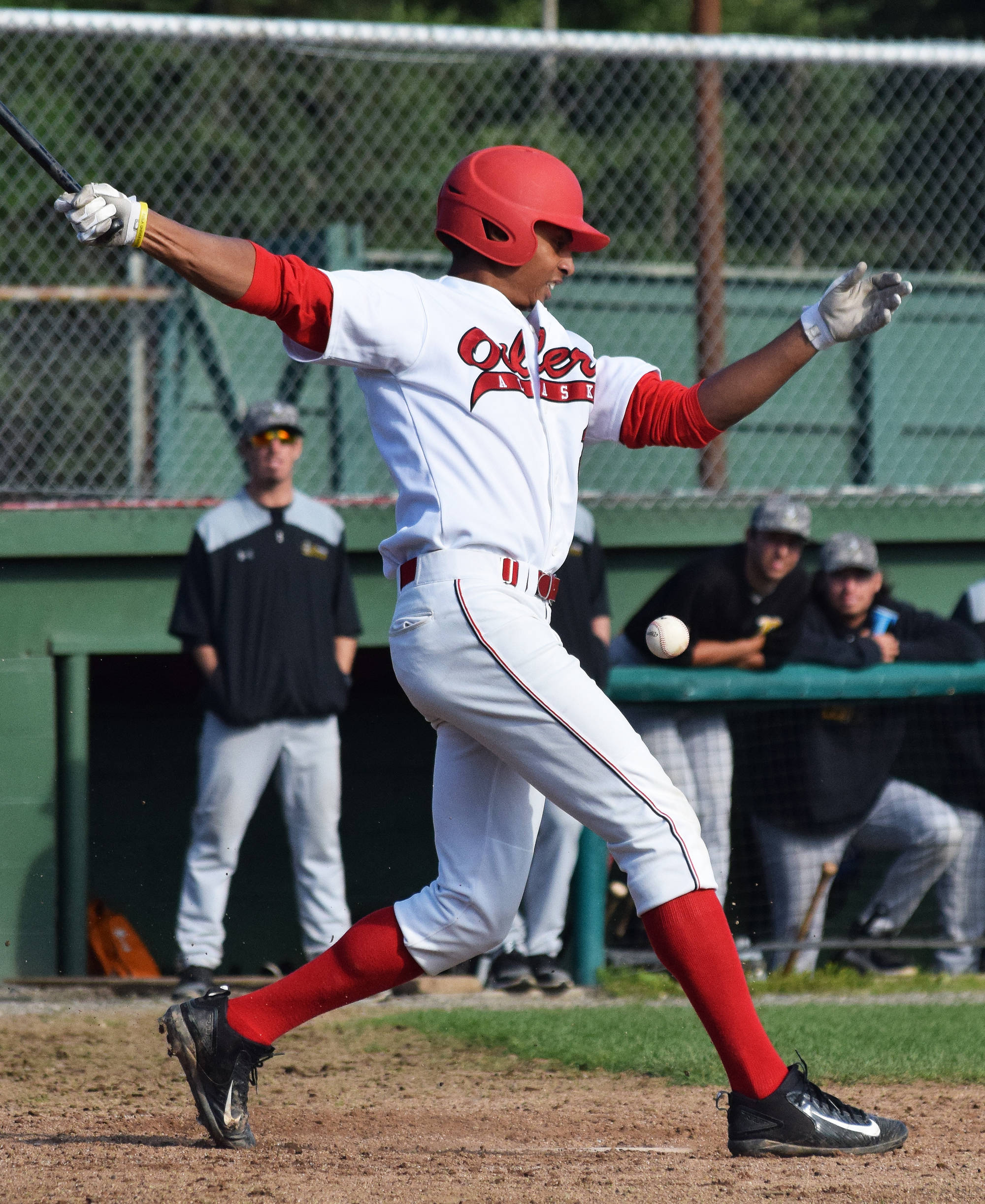 Raymond Kerr of the Peninsula Oilers swings at a pitch from the Anchorage Bucs Friday at Coral Seymour Memorial Ballpark in Kenai. (Photo by Joey Klecka/Peninsula Clarion)