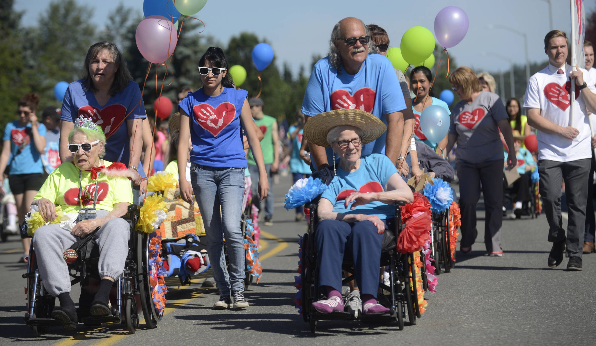 Residents and caretakers of Central Peninsula Hospital’s Heritage Place nursing home participate in Soldotna’s Progress Days Parade on Saturday, July 22, 2017.