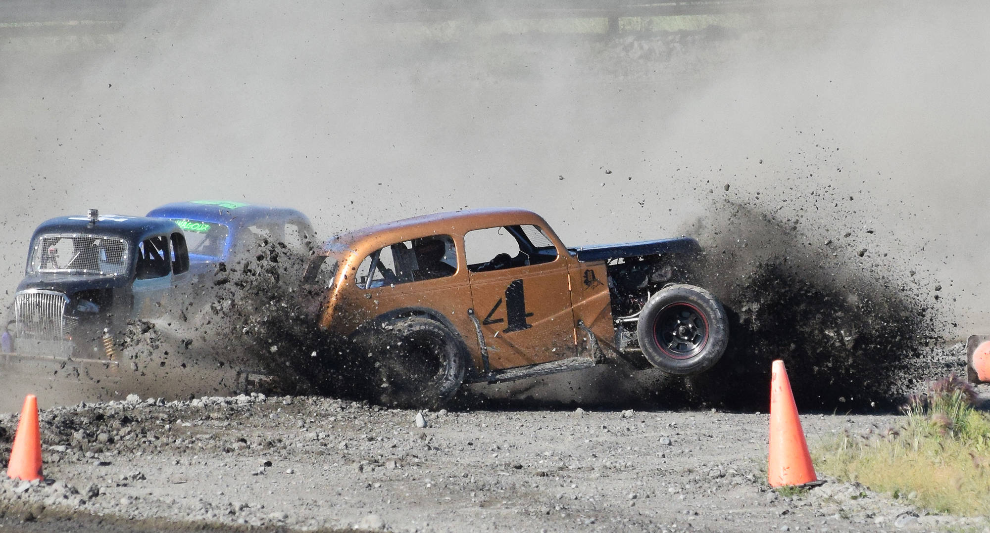 A Legends car racer spins out during the running of the Alaska Dirt Track Shootout held Saturday at Twin City Raceway in Kenai. (Photo by Joey Klecka/Peninsula Clarion)