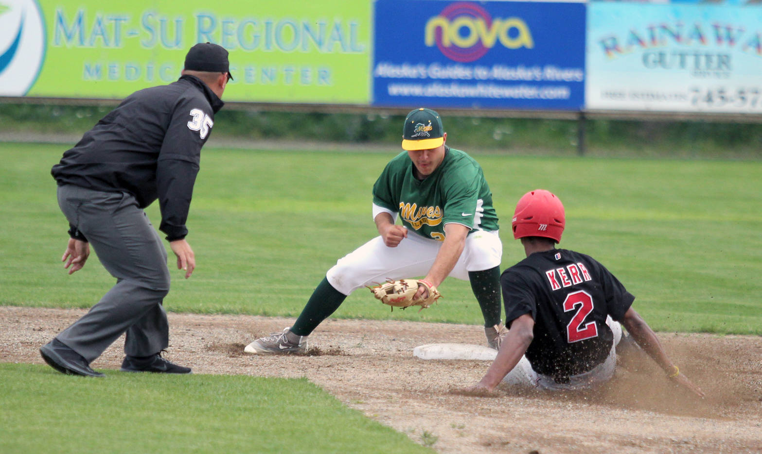 Mat-Su infielder Rainer Ausmus tags Raymond Kerr of the Peninsula Oilers out at second during Ma-Su’s 3-0 win over the Oilers on Monday, July 24, 2017, at Hermon Brothers Field in Palmer. (Photo by Jeremiah Bartz/Frontiersman)