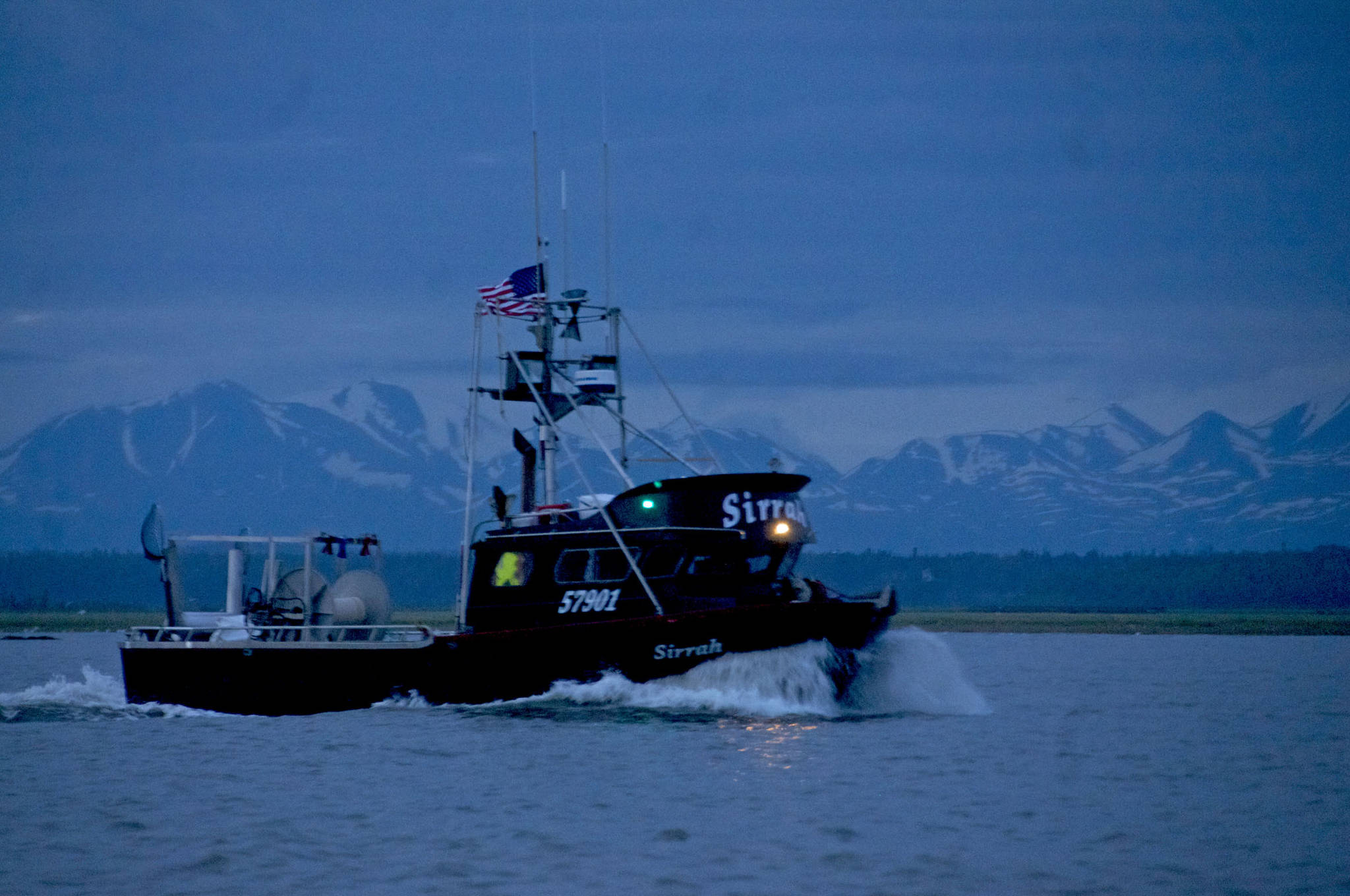In this July 2016 photo, a commercial drift gillnet boat makes its way out of the Kenai River early in the morning in Kenai, Alaska. (Photo by Elizabeth Earl/Peninsula Clarion, file)