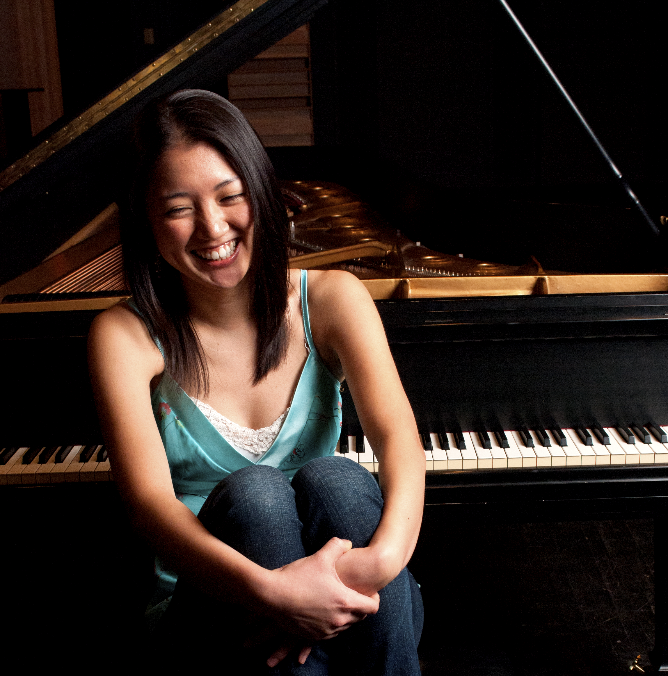 Classical pianist Miki Sawada poses with a piano in an undated portrait. Sawada will be traveling with a piano to perform free shows at several Kenai Peninsula venues during the coming week.