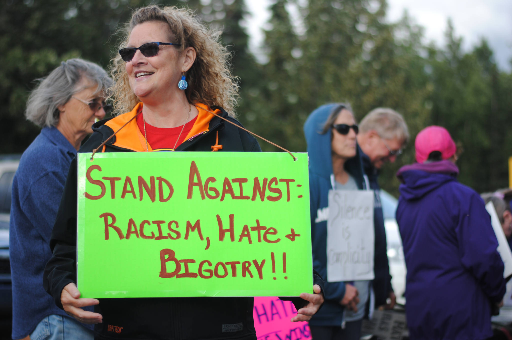 Michele Vasquez memorializes Heather Heyer at Soldotna Creek Park in Soldotna, Alaska on Wednesday, August 16, 2017. (Photo by Kat Sorensen/Peninsula Clarion)