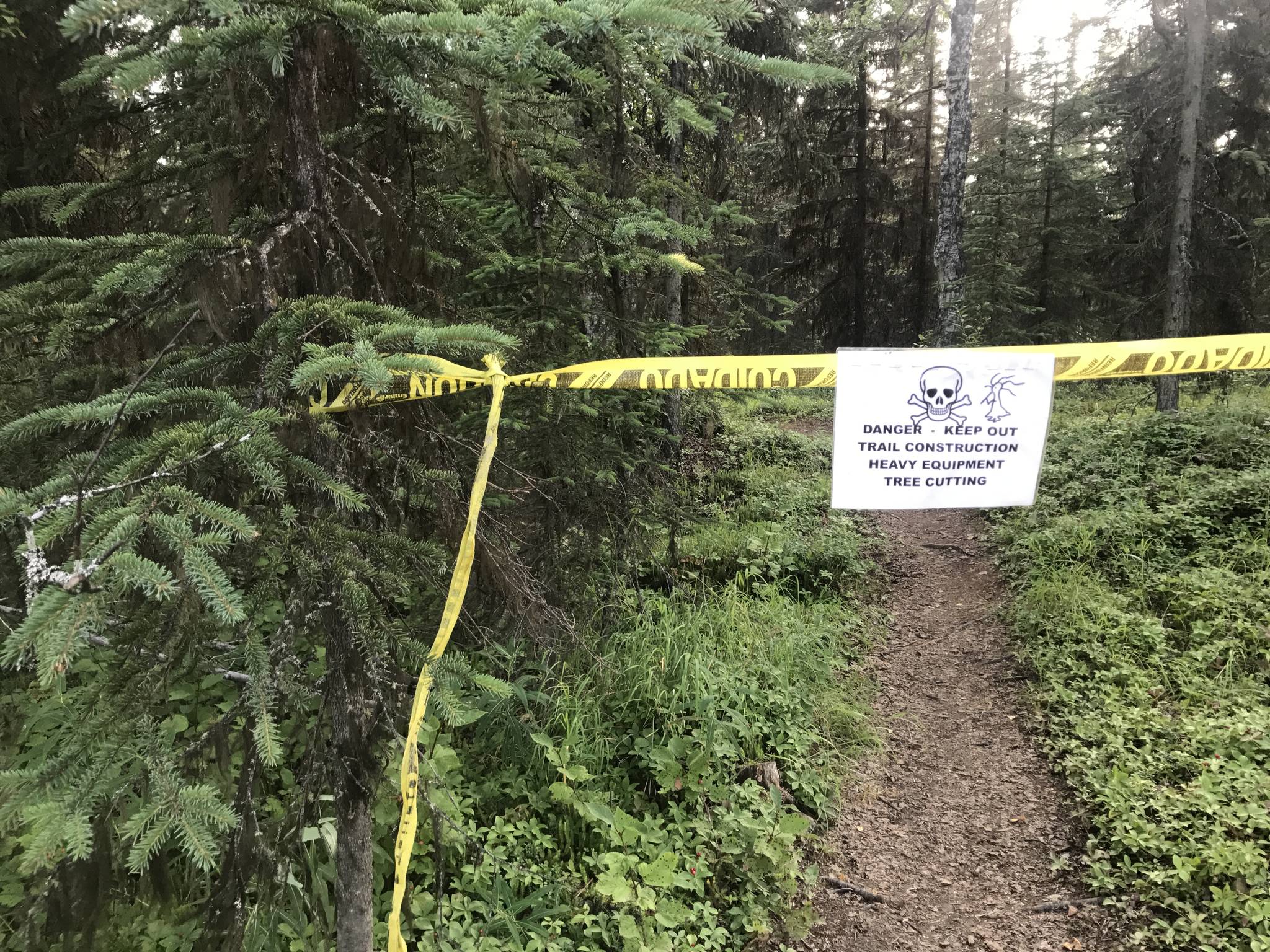 A trail is closed for trail maintenance on Tuesday as part of the Tsalteshi Trails Association work on singletrack taking place this week and next in Soldotna. (Photo by Kat Sorensen/Peninsula Clarion)
