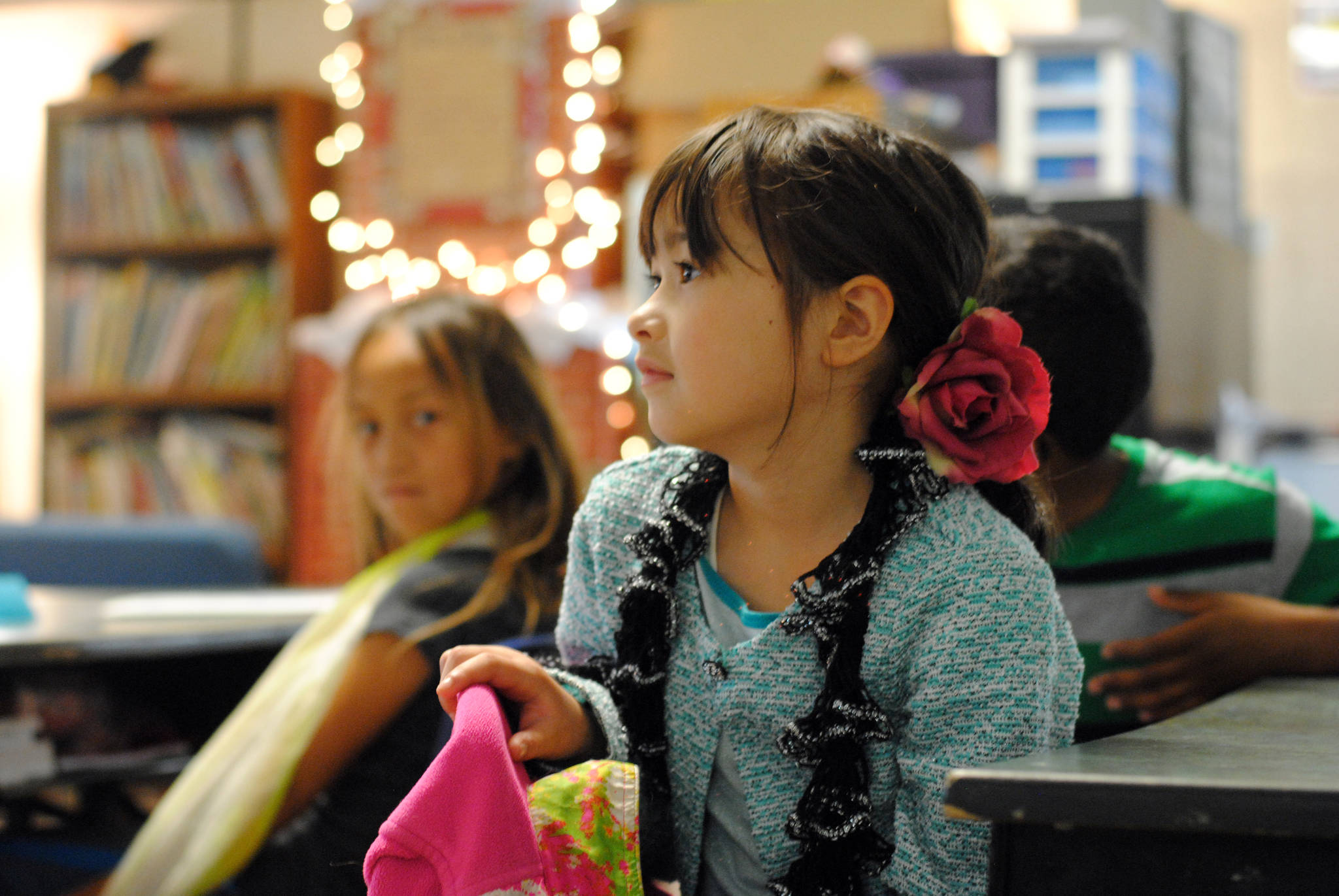Third-grader Ruka Olson listens as her teacher, Tanya Erwin, details the expectations in the classroom for the year on the first day of school at Nikiski North Star Elementary School on Tuesday, Aug. 22, 2017 in Nikiski, Alaska. (Photo by Kat Sorensen/Peninsula Clarion)