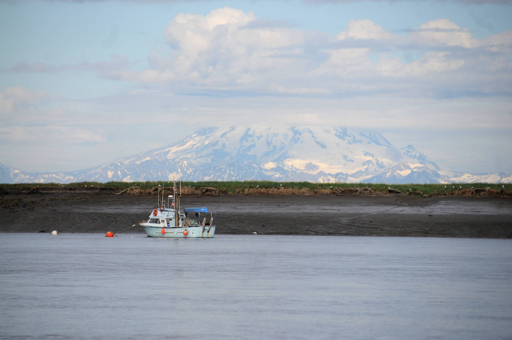 A drift boat rests at anchor in this July 2016 photo in Kenai, Alaska. (Photo by Elizabeth Earl/Peninsula Clarion, file)