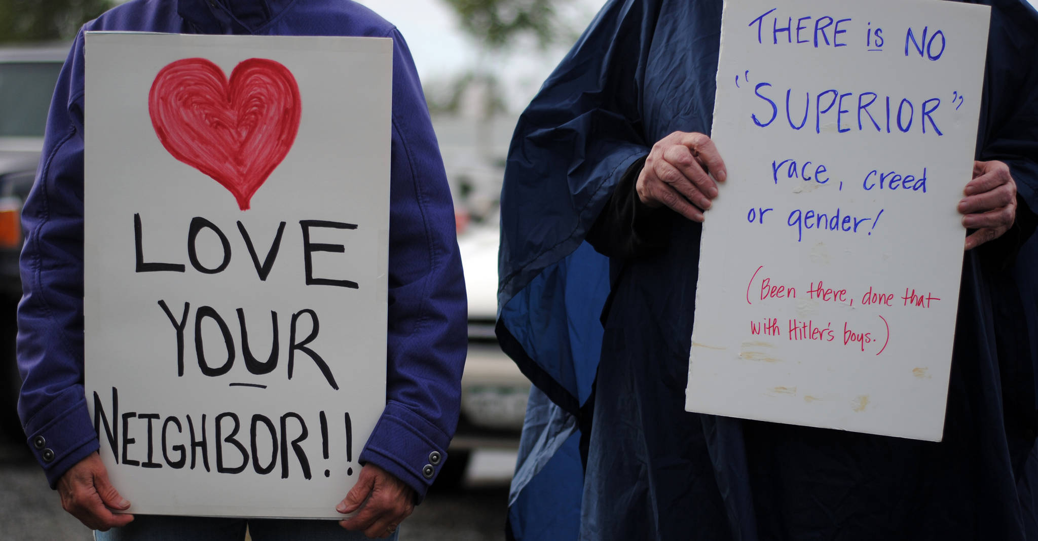 Community members gather in Soldotna Creek Park on Wednesday, August 16 in memorium of Heather Heyer, the woman killed during protests in Charlottesville, Virginia earlier this month. Organizers of the memorial walk have decided to continue the event for the next two weeks. (Photo by Kat Sorensen/Peninsula Clarion)