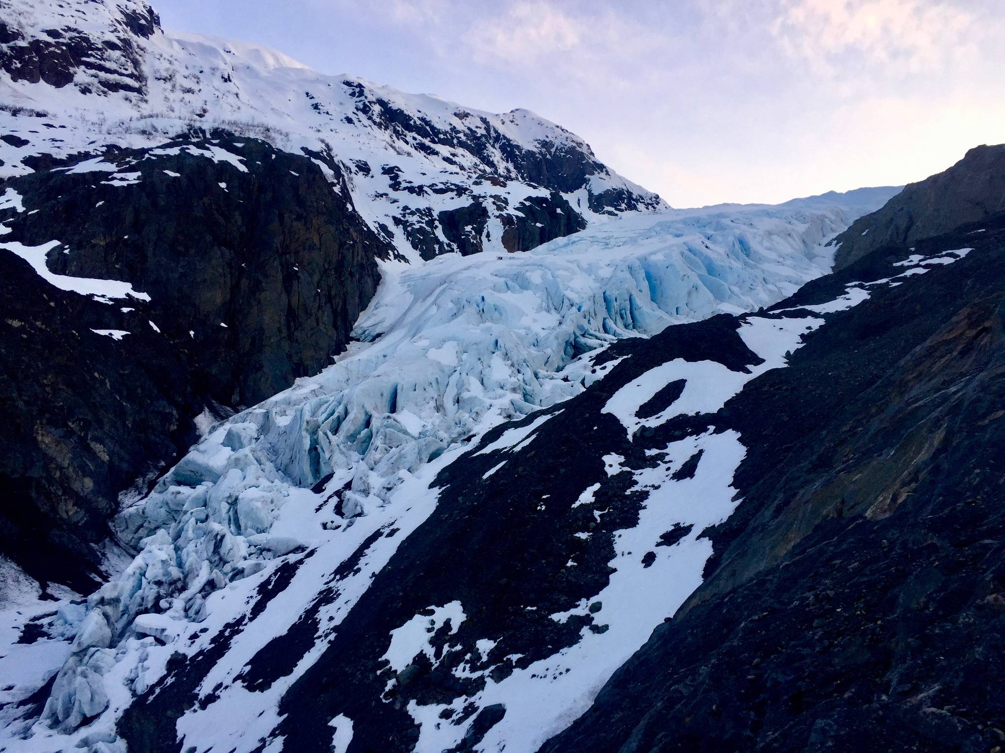 This May 2017 photo shows Exit Glacier at its outfall near Seward, Alaska. The glacier, one of the most visited parks in Alaska, been retreating more rapidly in recent years and the National Park Service recently issued a warning for visitors to stay away from its toe and sides because of the risk of ice fall. (Photo by Elizabeth Earl/Peninsula Clarion)