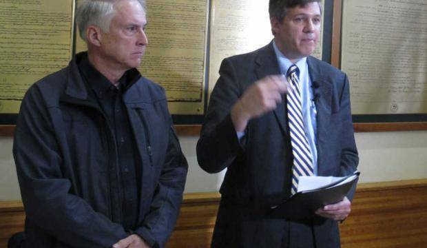 Former state Sen. Rick Halford, left, and current state Sen. Bill Wielechowski answer questions about a lawsuit they filed at a press conference on Friday, Sept. 16, 2016, in Anchorage. The lawsuit filed by Wielechowski, Halford and former state Sen. Clem Tillion claimed Gov. Bill Walker acted illegally in vetoing half the money designated for the Alaska Permanent Fund Dividend. (Dan Joling | Associated Press)
