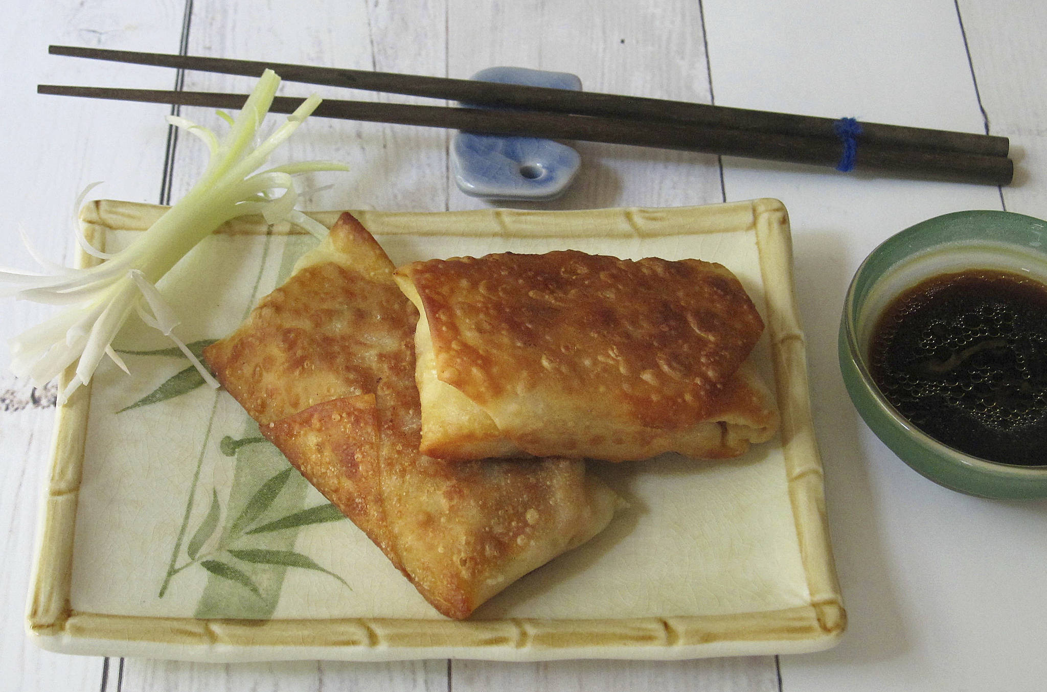 This August 2017 photo shows “not fried egg rolls” in New York. This dish is from a recipe by Sara Moulton. (Sara Moulton via AP)