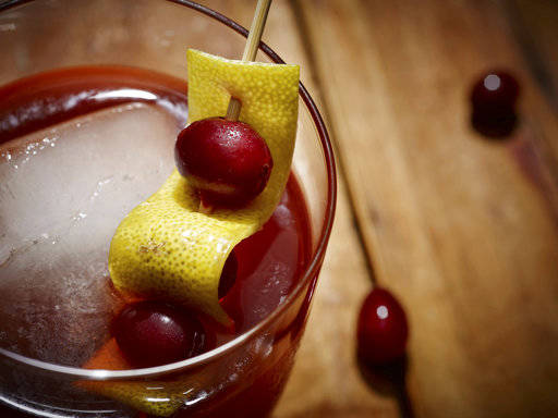 This 2017 photo provided by The Culinary Institute of America shows a “Cortland Jab” cider cocktail in Hyde Park, N.Y. This drink is from a recipe by the CIA. (Phil Mansfield/The Culinary Institute of America via AP)