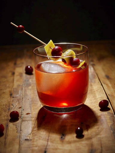 This 2017 photo provided by The Culinary Institute of America shows a “Cortland Jab” cider cocktail in Hyde Park, N.Y. This drink is from a recipe by the CIA. (Phil Mansfield/The Culinary Institute of America via AP)