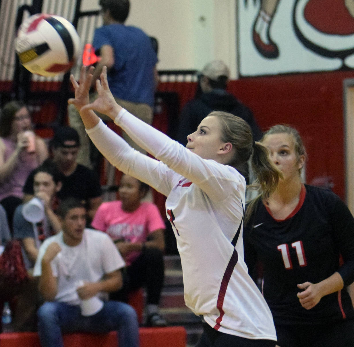 Kenai Central’s Hayley Maw passes the ball against Palmer on Wednesday, Sept. 6, 2017, at Kenai Central High School. (Photo by Jeff Helminiak/Peninsula Clarion)