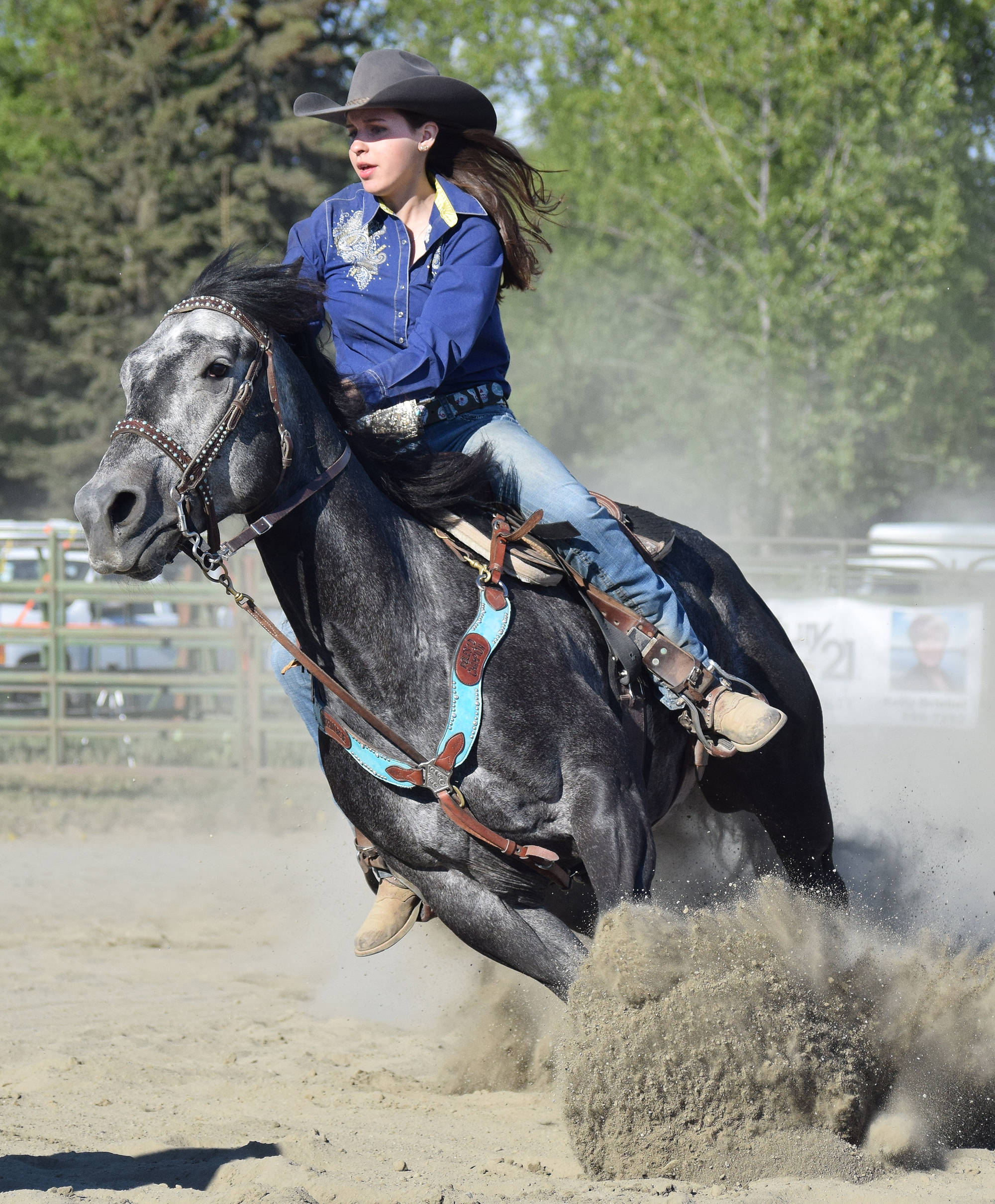 Katy Jones guides her horse in the right direction in the barrel racing event June 3 at the Soldotna Rodeo Series at the Soldotna Rodeo Grounds. Photo by Joey Klecka/Peninsula Clarion