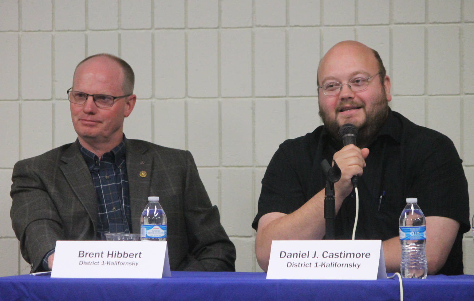 Brent Hibbert, left, listens while Dan Castimore answers a question during a forum for Kenai Peninsula Borough Assembly candidates Wednesday at a joint meeting of the Kenai and Soldotna Chambers of Commerce. Hibbert and Castimore are running for the District 1-Kalifornsky seat. (Photo by Will Morrow/Peninsula Clarion)