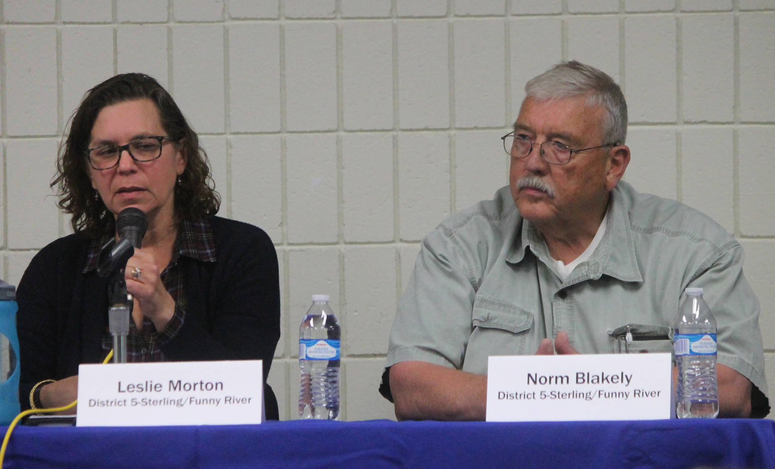 Leslie Morton, left, answers a question while Norm Blakeley listens during a forum for Kenai Peninsula Borough Assembly candidates Wednesday at a joint meeting of the Kenai and Soldotna Chambers of Commerce. Morton and Blakely are running for the District 5-Sterling/Funny River seat. (Photo by Will Morrow/Peninsula Clarion)