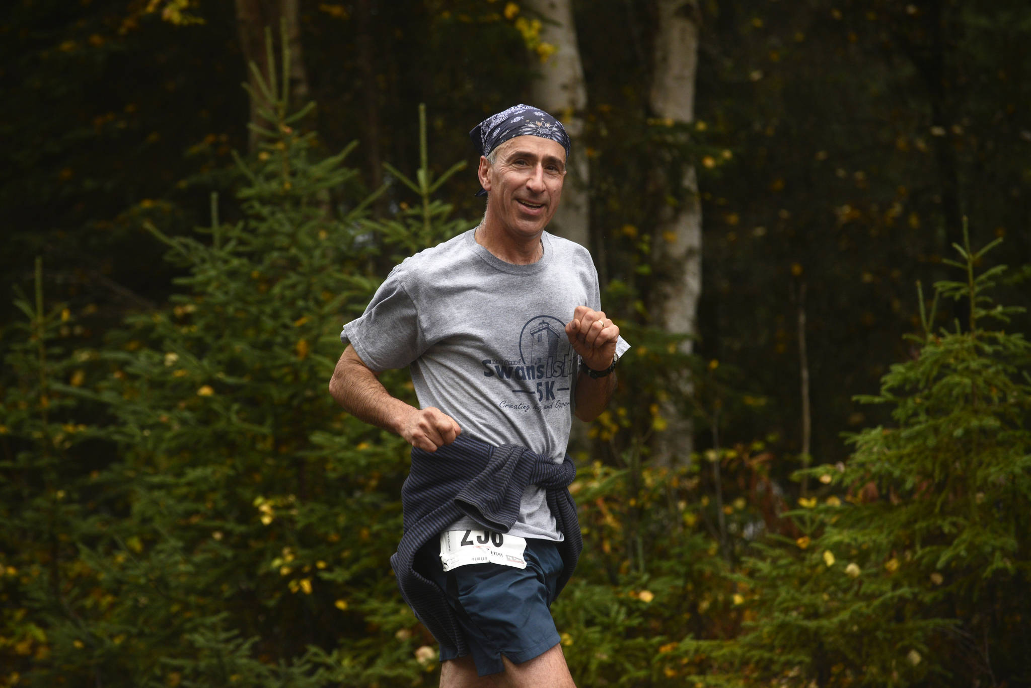 Victor Samoei runs in the Kenai River half-marathon on Sunday, Sept. 24, 2017 near Kenai, Alaska.
