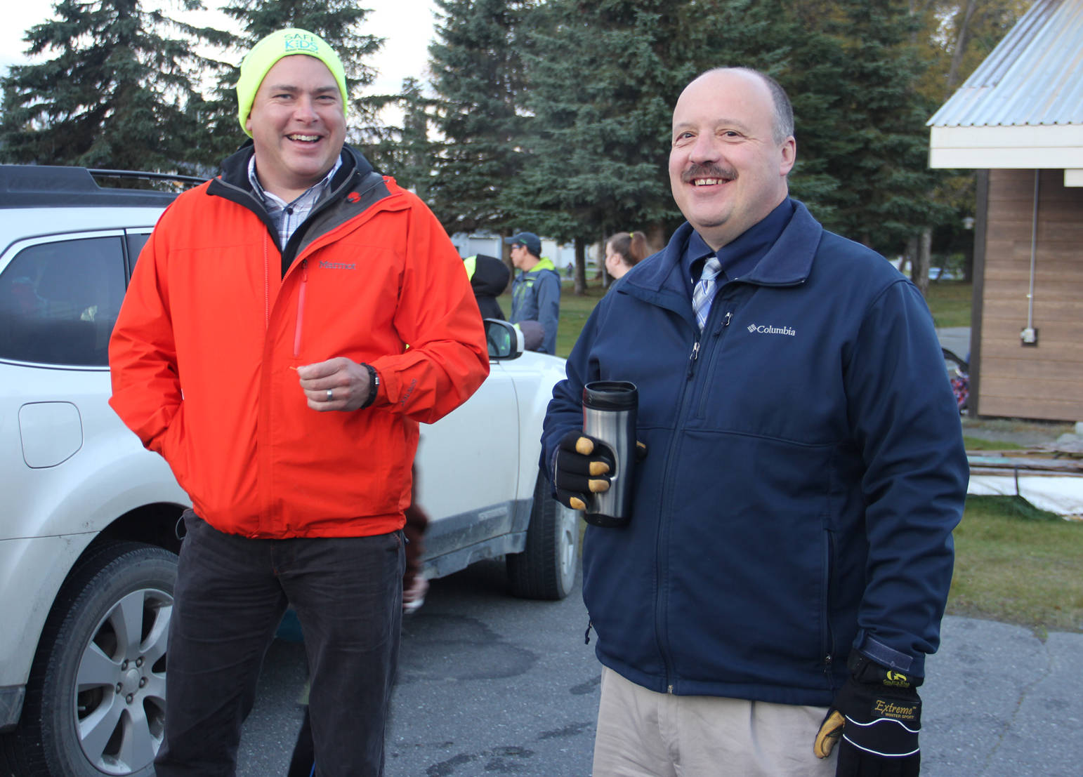 KPBSD Superintendent Sean Dusek and Redoubt Elementary Principal Bill Withrow join kids walking to school.
