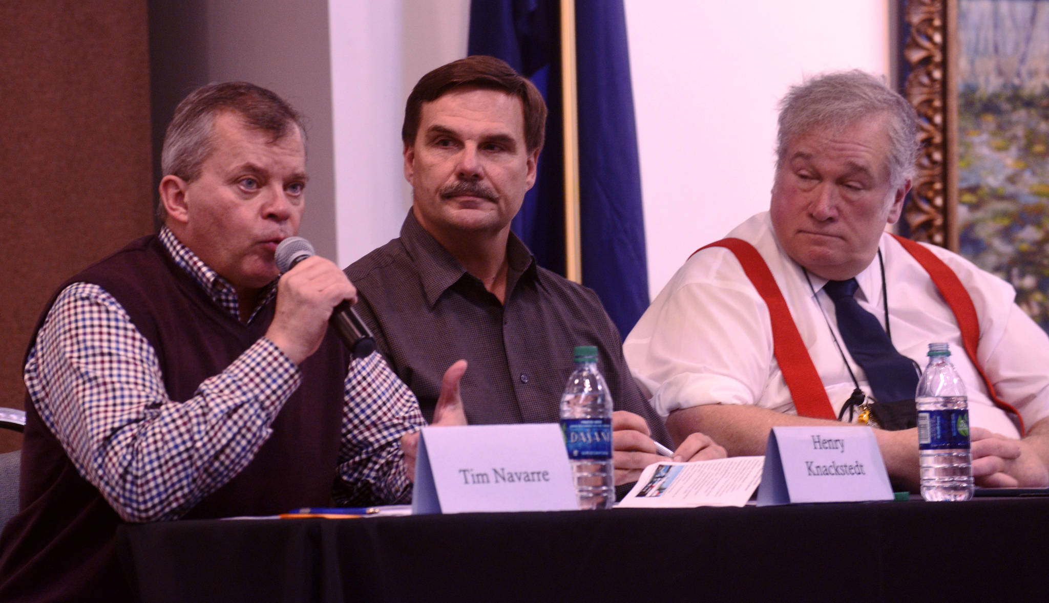 This year’s three Kenai city council candidates — incumbents Tim Navarre (left) and Henry Knackstedt, and newcomer Bob McIntosh — respond to questions during a discussion on Wednesday in the Kenai Chamber of Commerce and Visitor Center. After the municipal elections on Oct. 3, the two top vote-getters will take the two open seats on the seven-person Kenai city council.