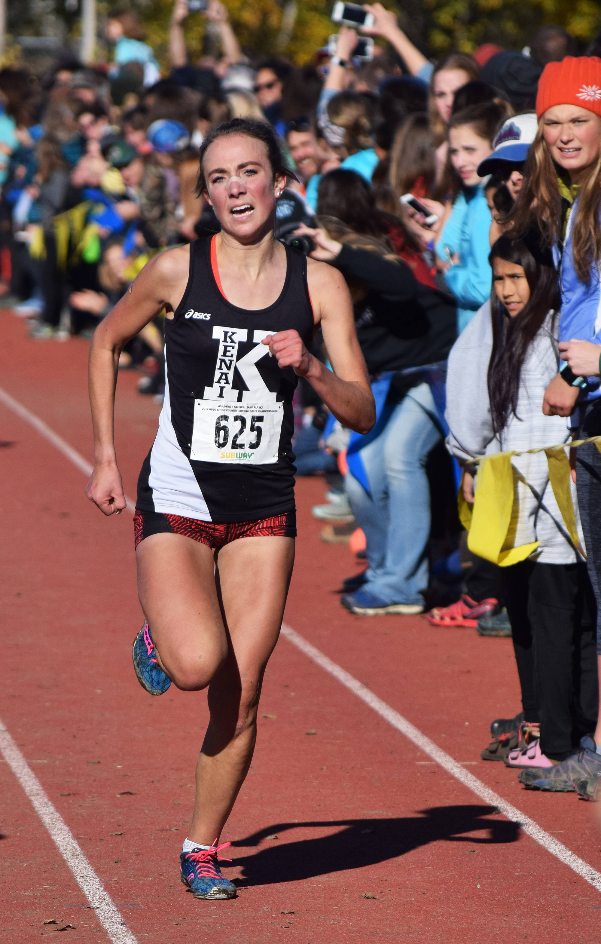 Kenai Central senior Riana Boonstra races to the finish of the Division I girls race Saturday at the ASAA First National Bank Alaska Cross-country State Championships at Bartlett High School. (Photo by Joey Klecka/Peninsula Clarion)