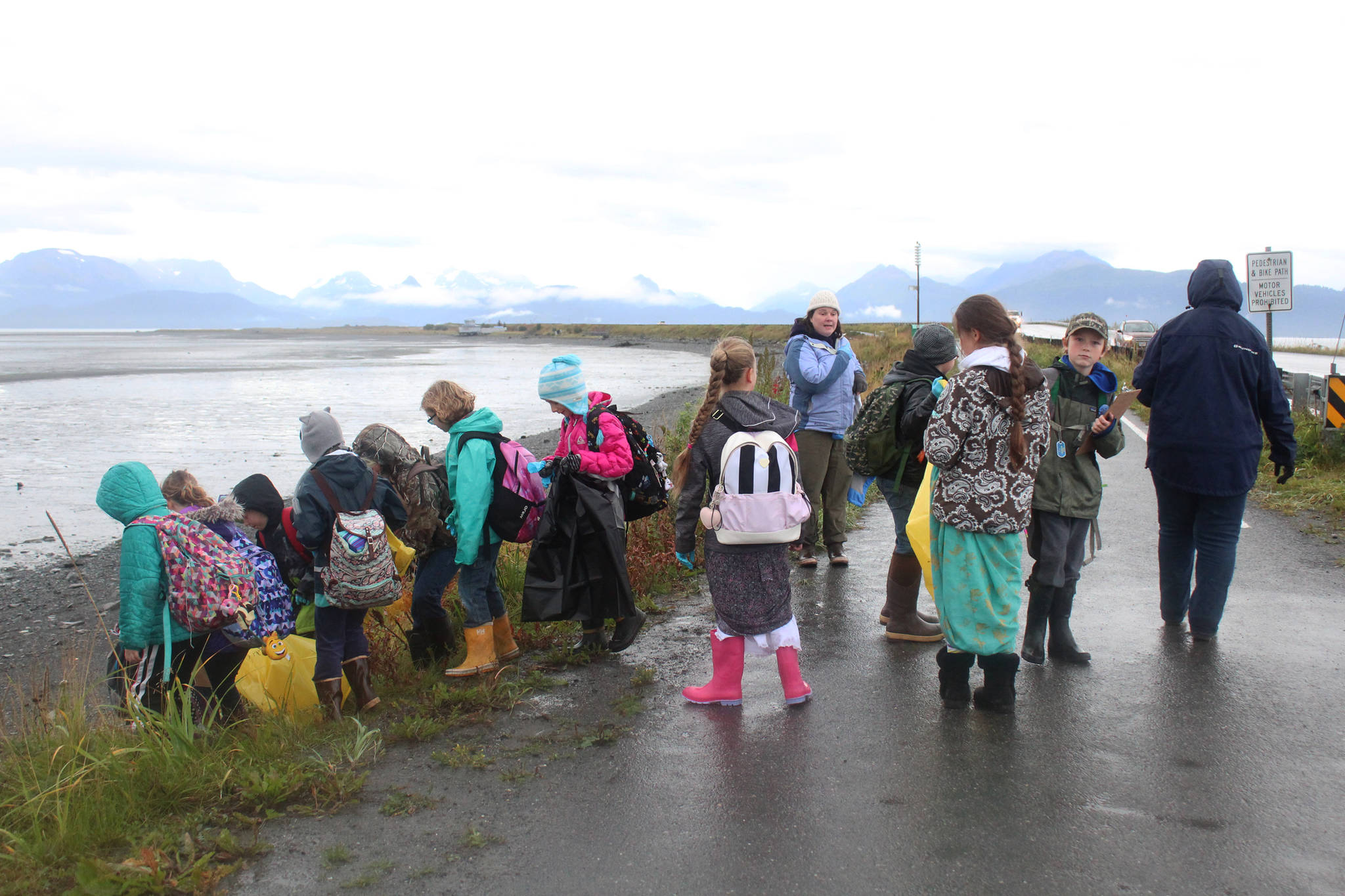 Kendall Dellasperanza’s fourth grade class from McNeil Canyon Elementary School prepares to scour a section of shoreline for trash Friday, Sept. 22 near Mariner Park in Homer. (Photo by Megan Pacer/Homer News.)