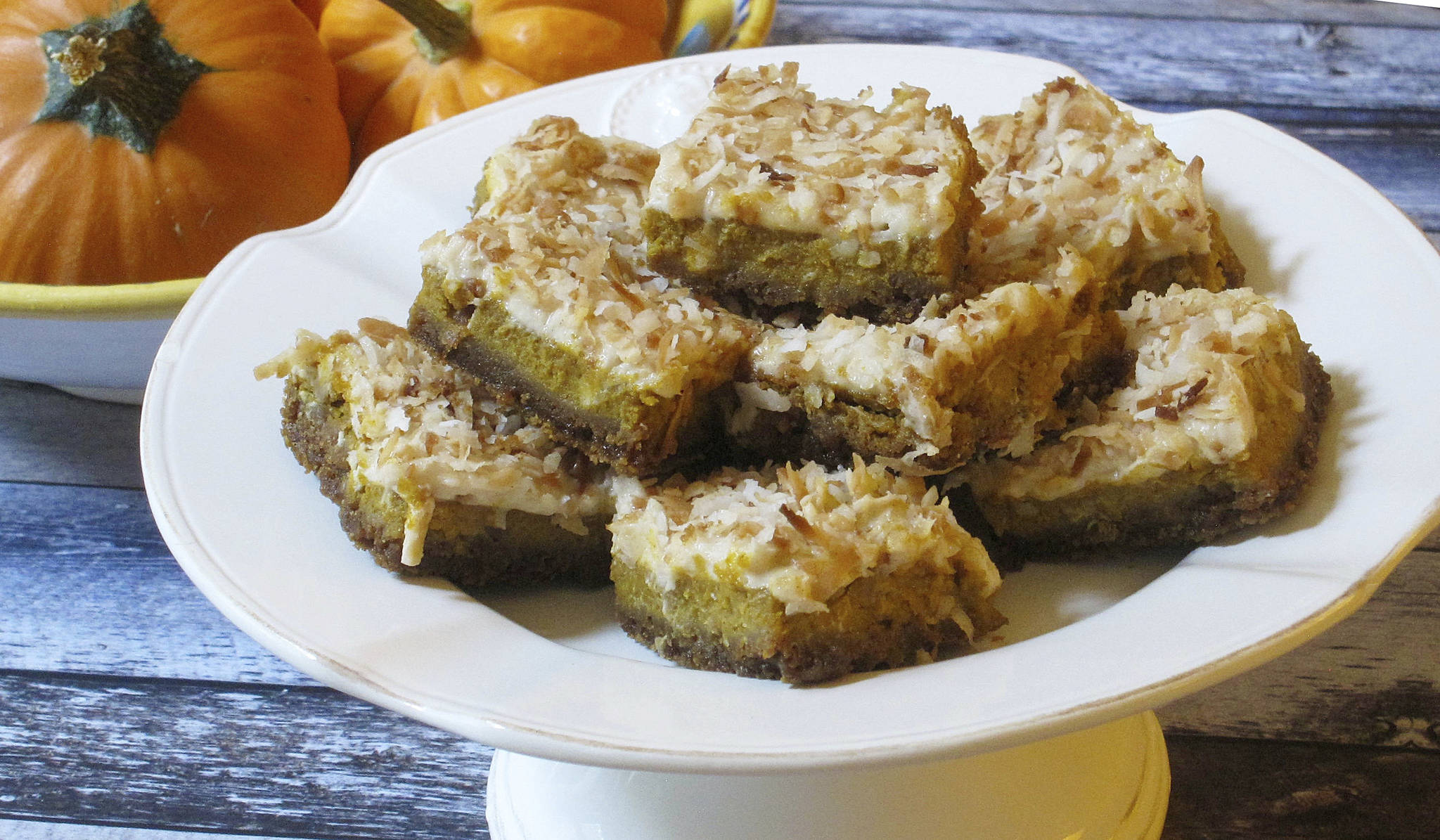 This Sept. 25 photo shows pumpkin coconut squares in New York. This dish is from a recipe by Sara Moulton. (Sara Moulton via AP)